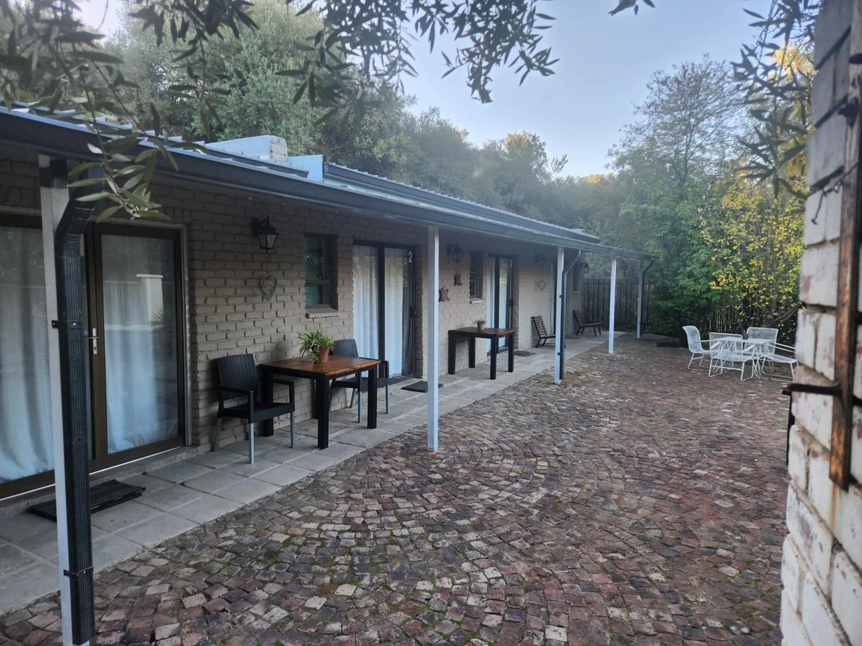 Deluxe Double Room (2 Adults + 1 Child) - single occupancy in Mimosa Guesthouse