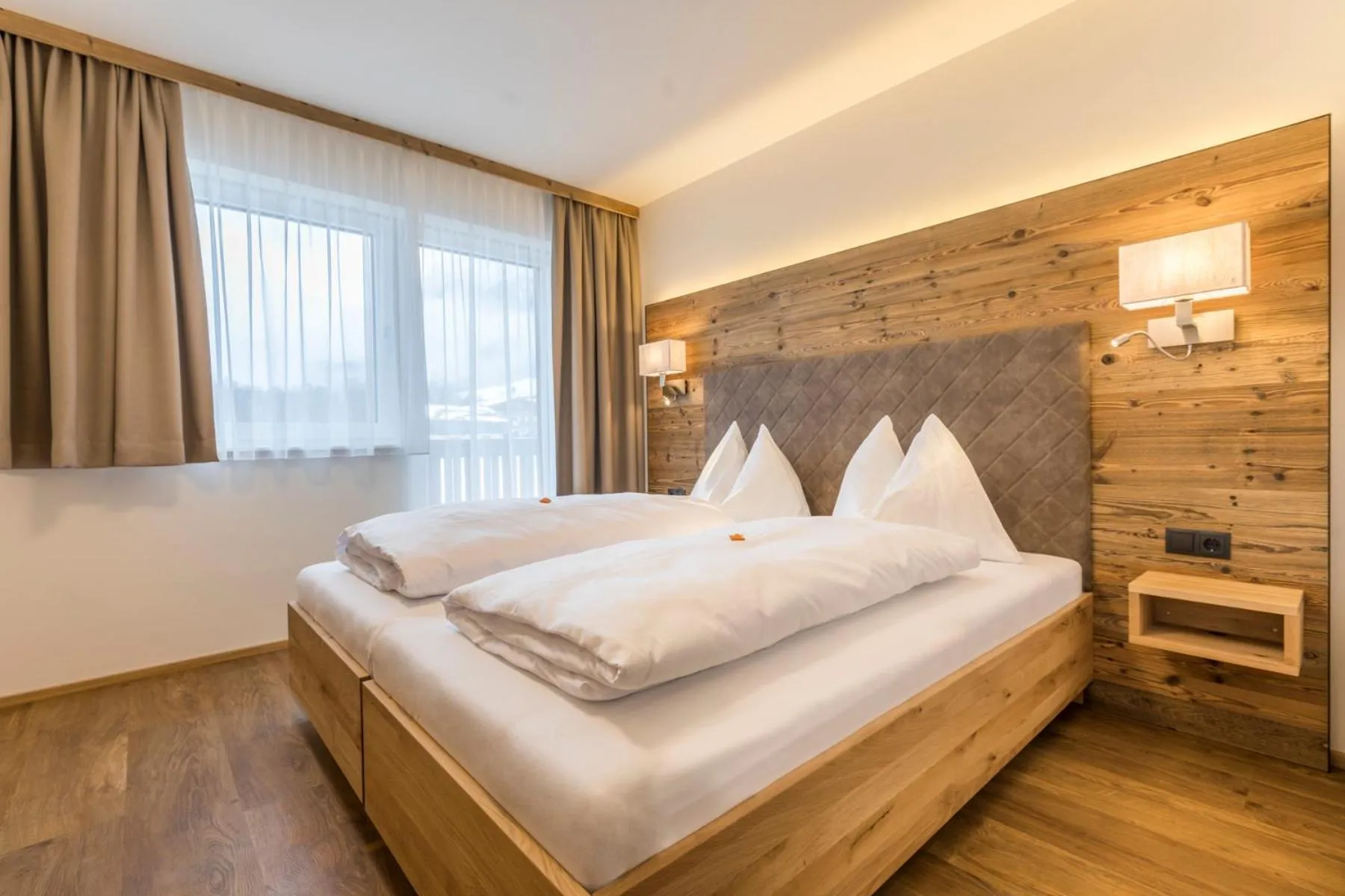 Bed in OFENTÜRL alpine living