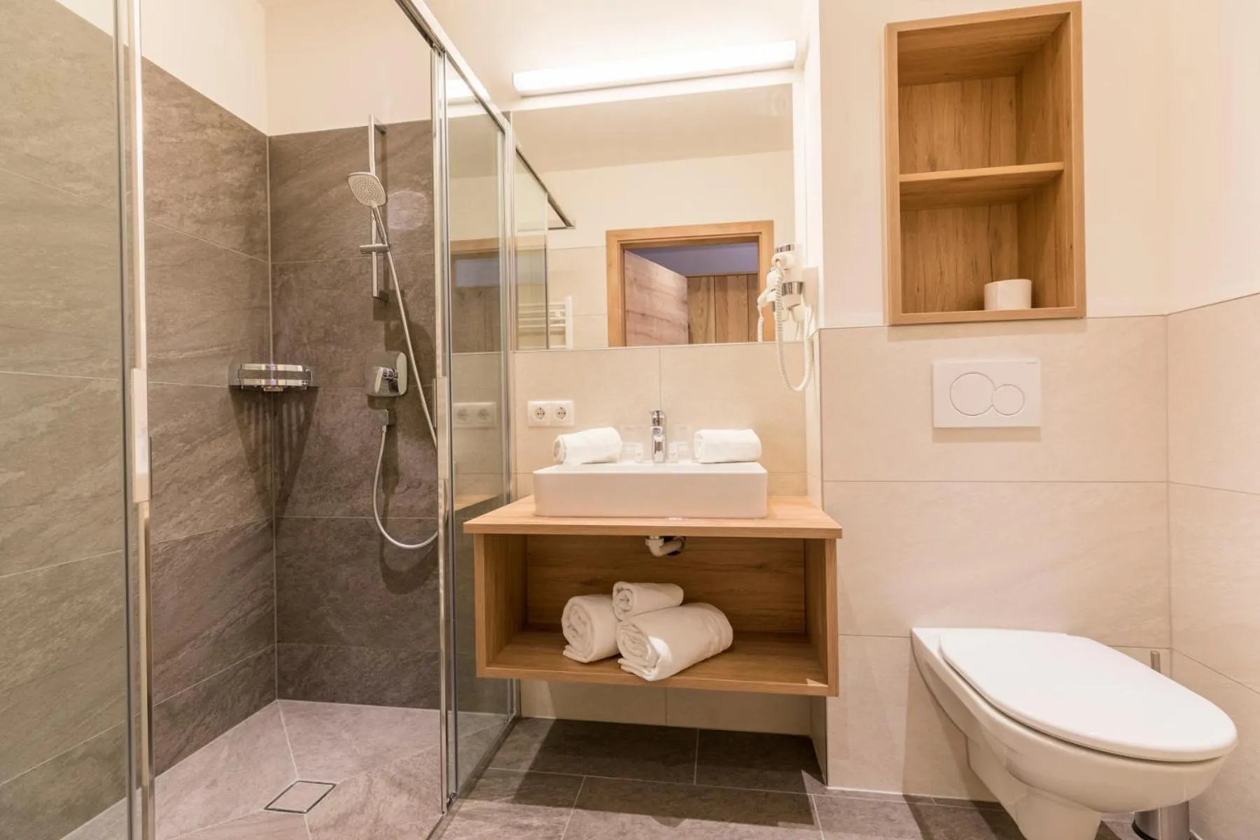 Bathroom in OFENTÜRL alpine living