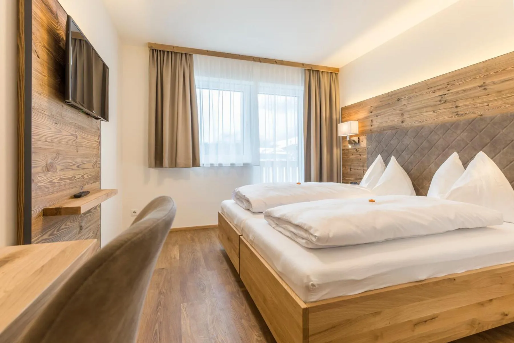 Bed in OFENTÜRL alpine living