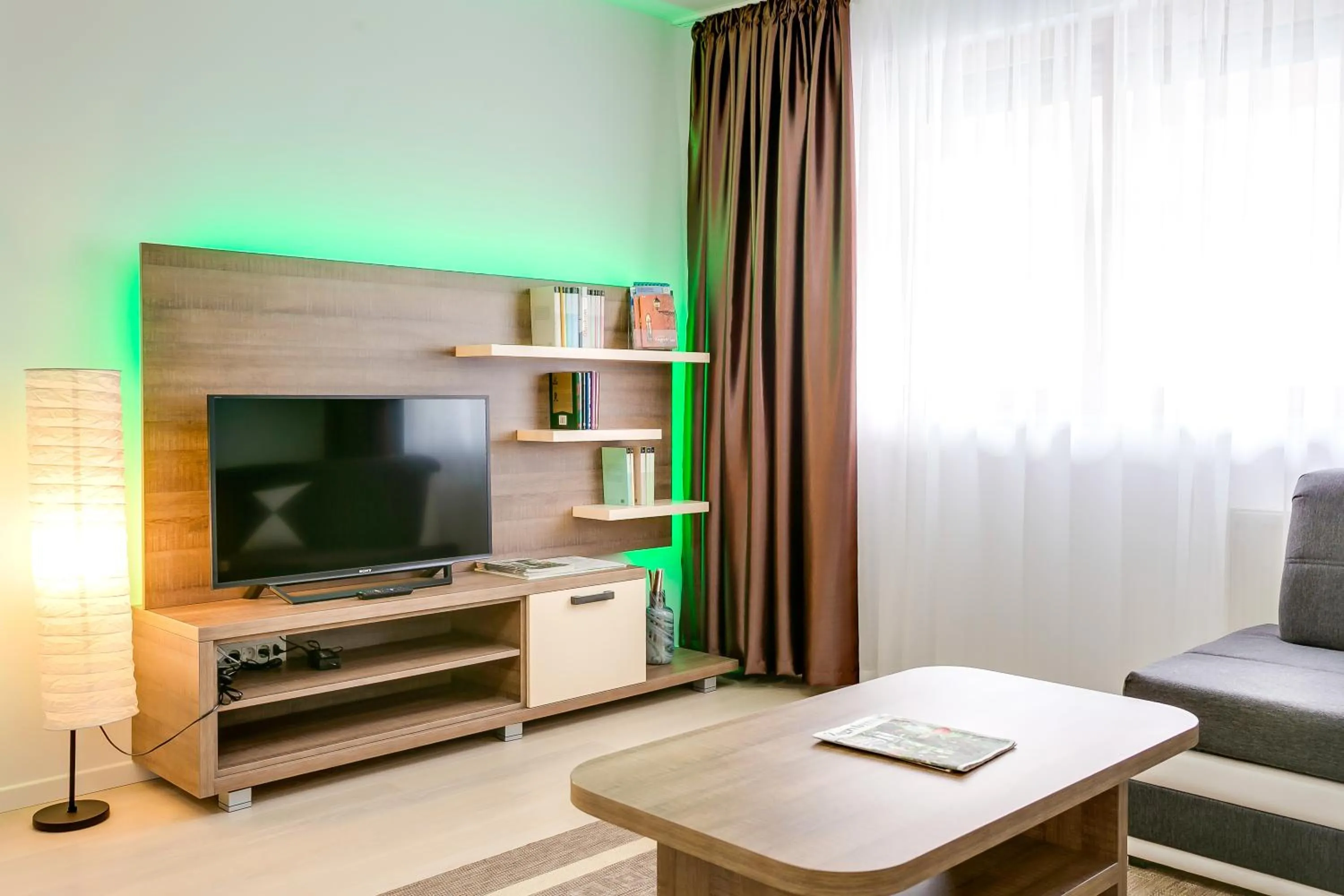 TV and multimedia in Modern Two-Bedroom Apartment, Free Garage Parking