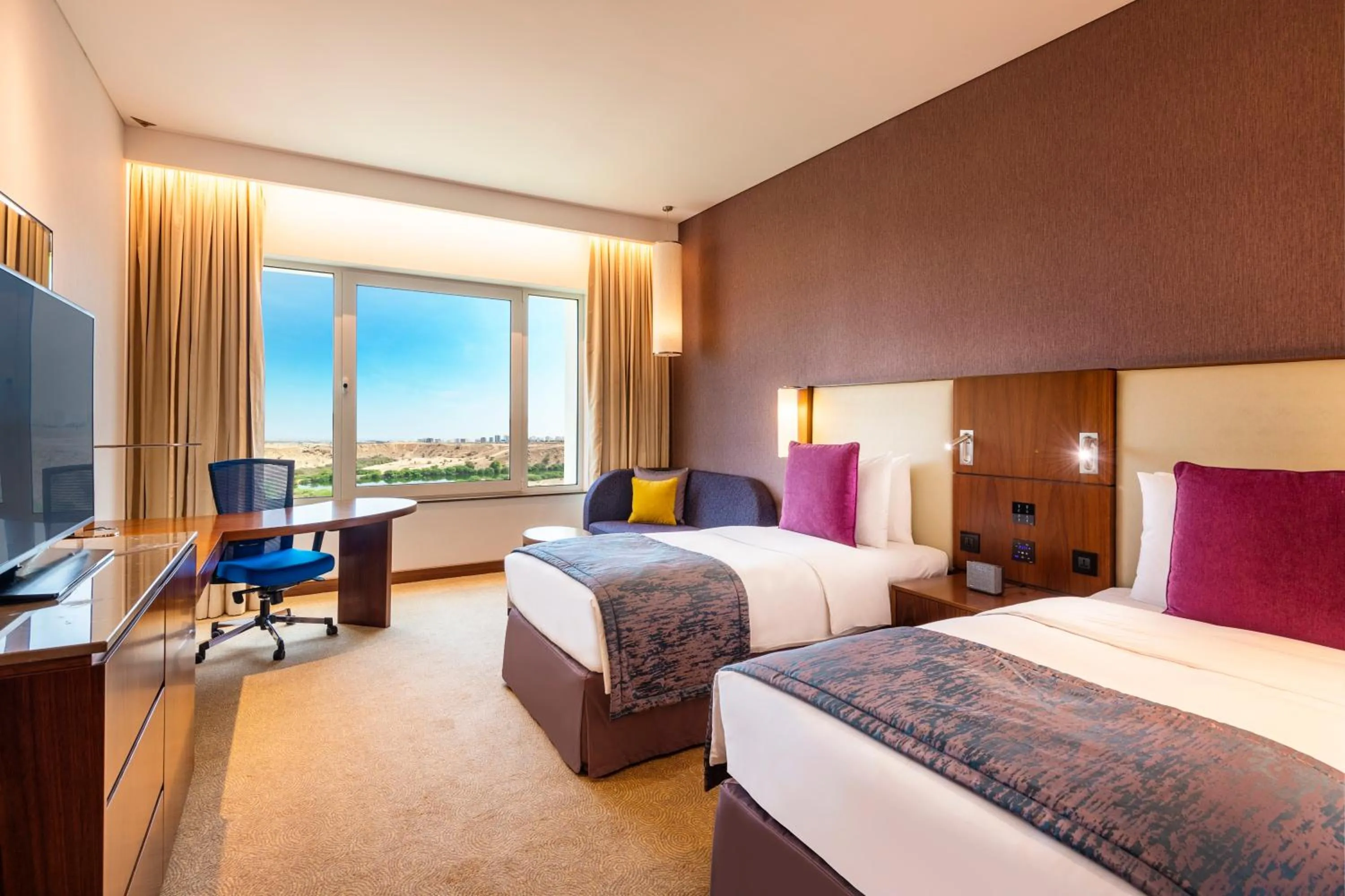 Photo of the whole room, Bed in Crowne Plaza Muscat OCEC by IHG