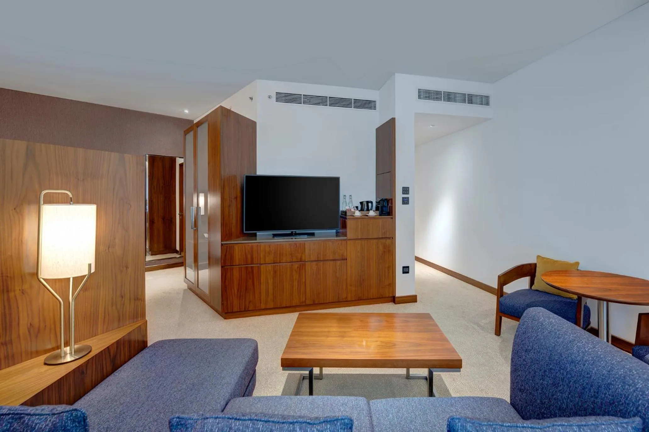 Living room in Crowne Plaza Muscat OCEC by IHG