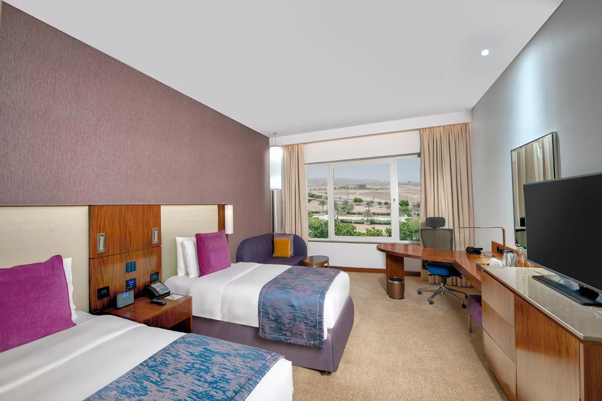 Bed in Crowne Plaza Muscat OCEC by IHG