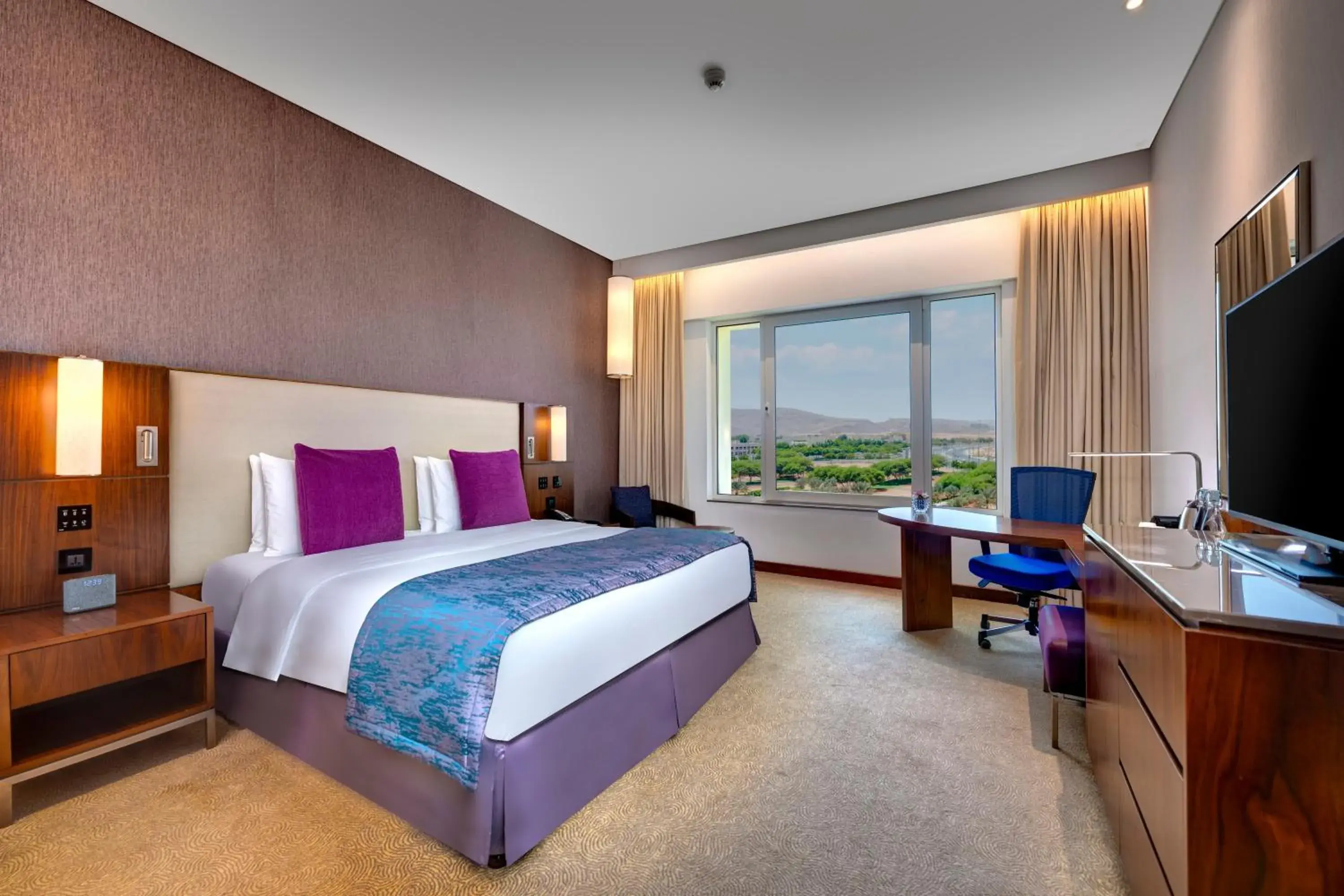 Bedroom, Bed in Crowne Plaza Muscat OCEC by IHG Bedroom, Bed in Crowne Plaza Muscat OCEC by IHG