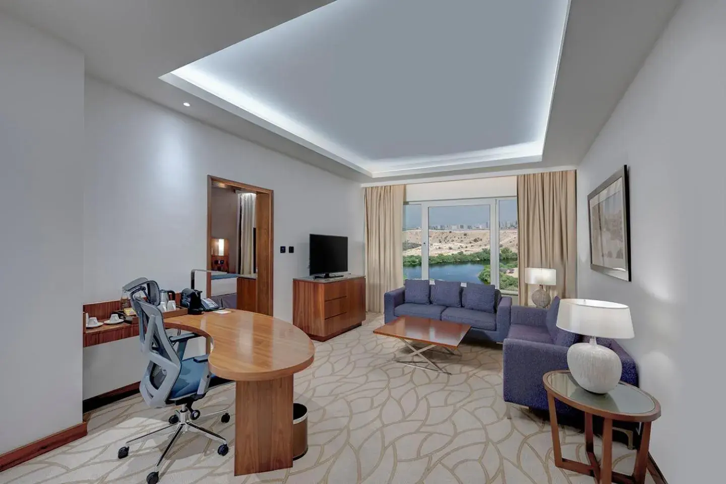 Living room in Crowne Plaza Muscat OCEC by IHG Living room in Crowne Plaza Muscat OCEC by IHG