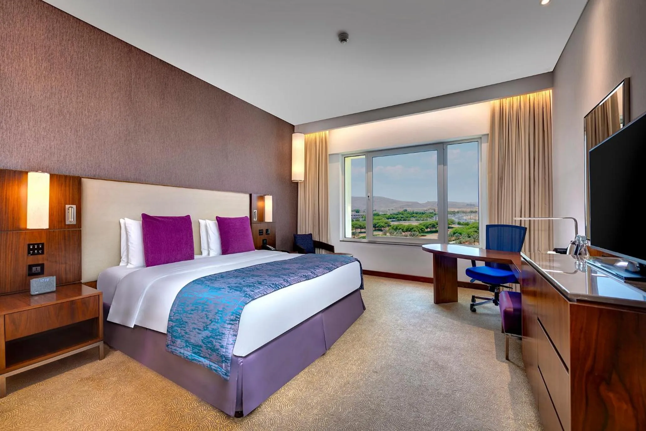 Bed in Crowne Plaza Muscat OCEC by IHG