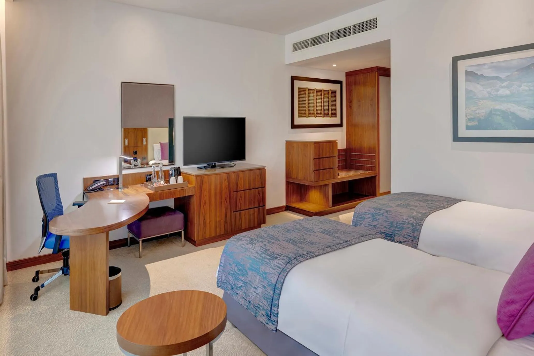 Bed in Crowne Plaza Muscat OCEC by IHG