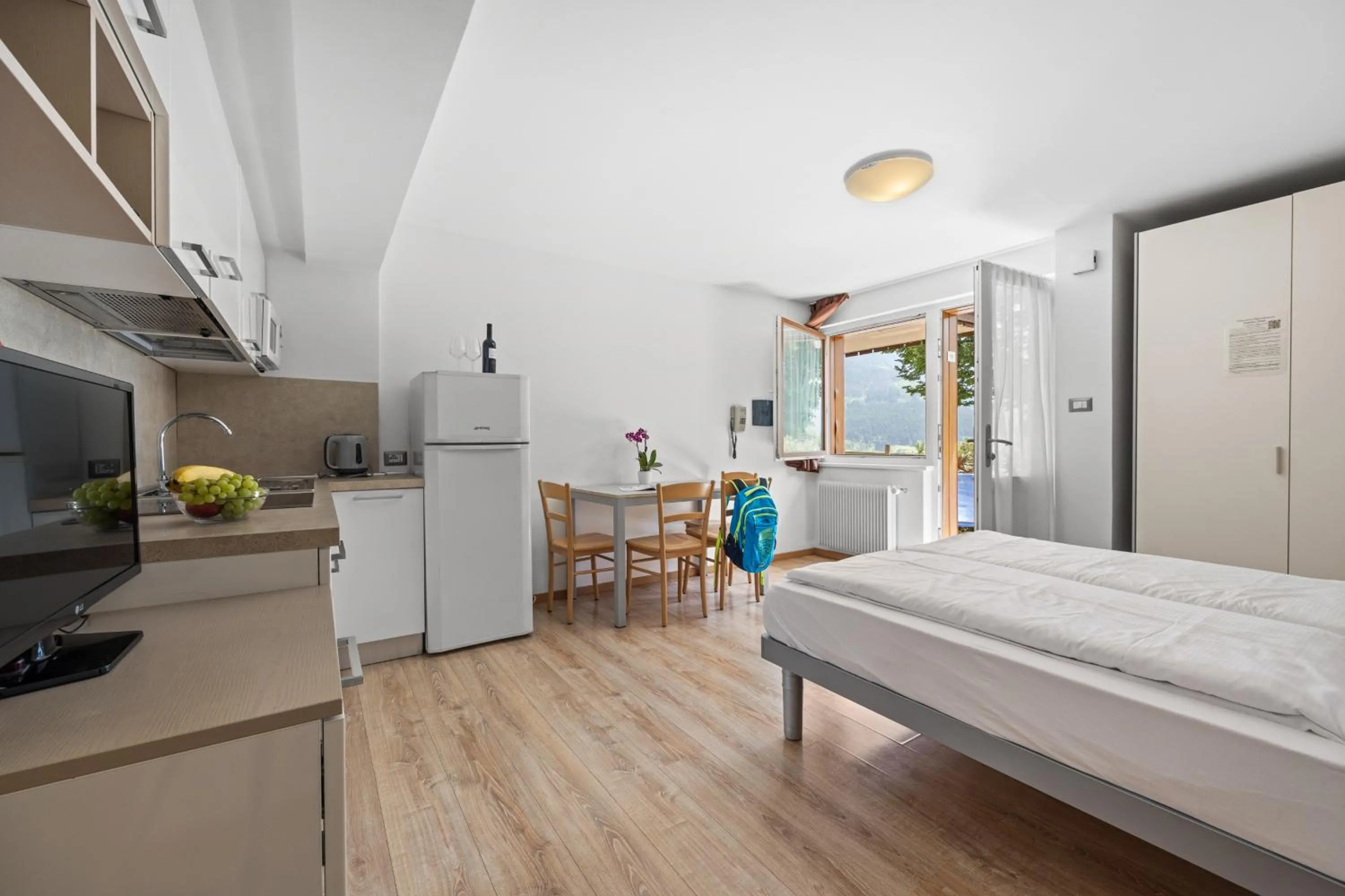 Kitchen or kitchenette, Bed in Residence Lagorai