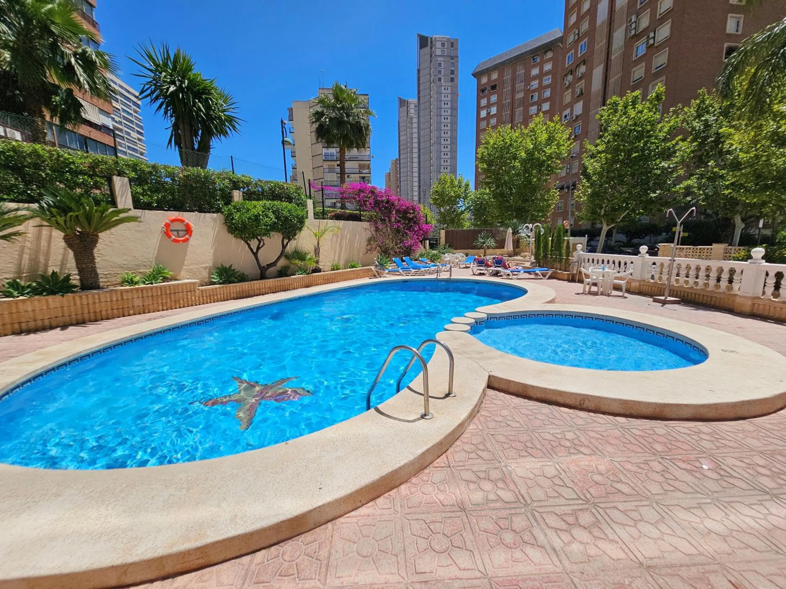 Swimming pool in Apartamentos Maria Victoria