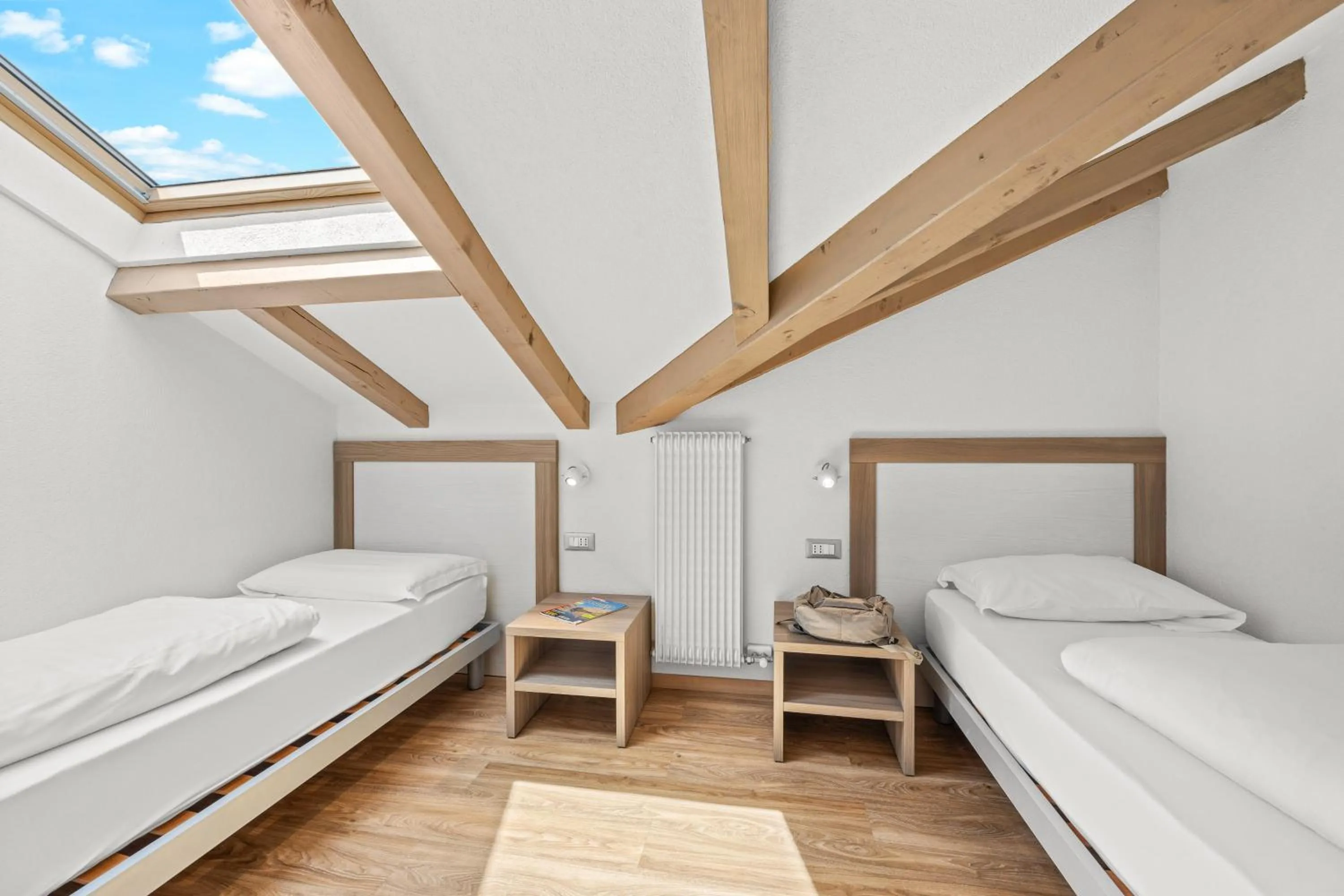 Bed in Aparthotel Des Alpes