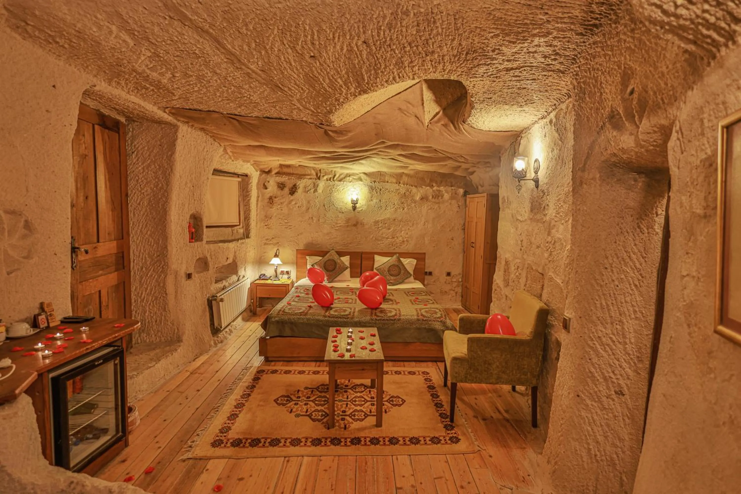 Bed in La Casa Cave Hotel