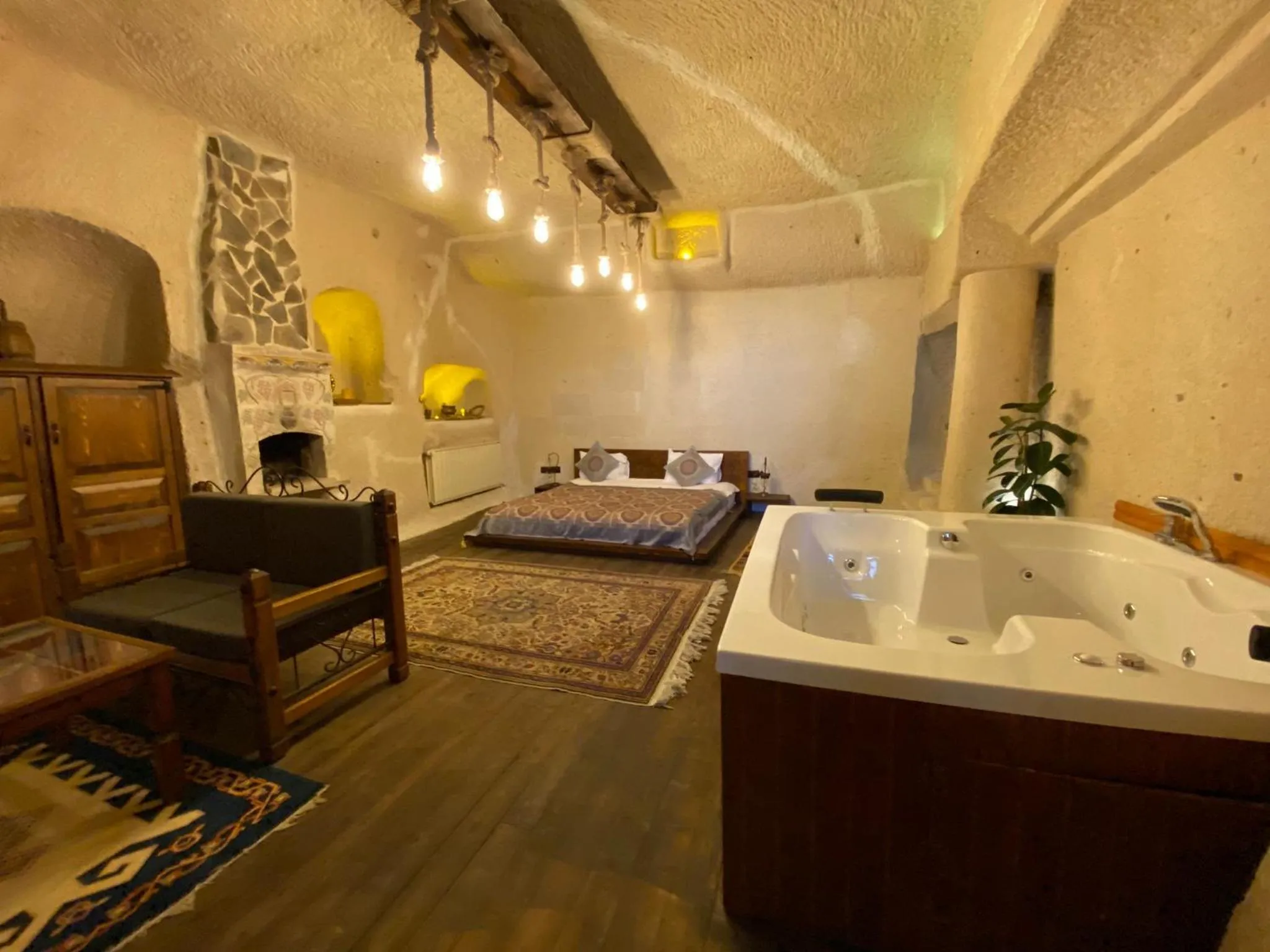 Bed in La Casa Cave Hotel