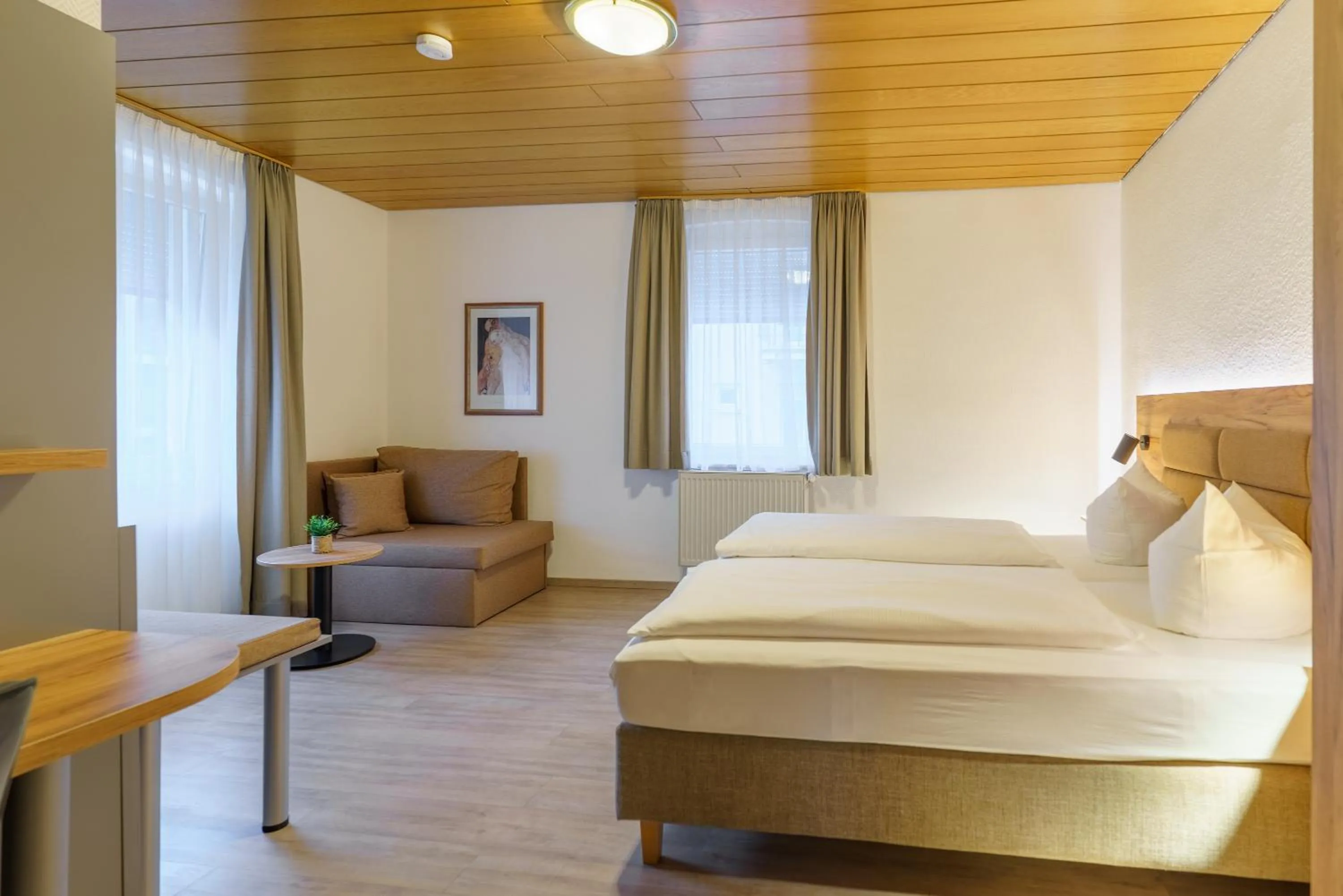 Photo of the whole room, Bed in Stadthotel Pfeffermühle