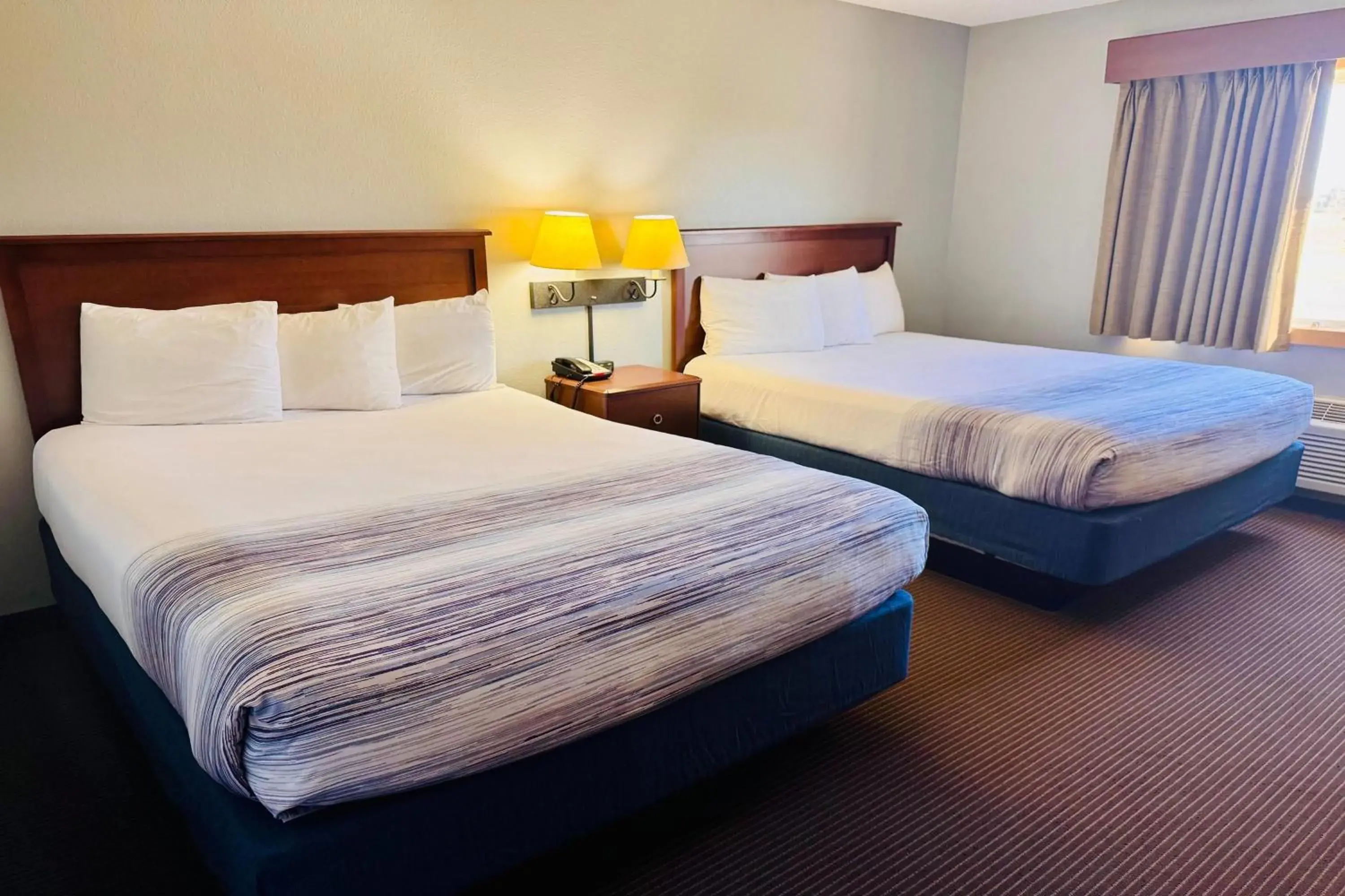 Queen Room with Two Queen Beds in AmericInn by Wyndham Stillwater Queen Room with Two Queen Beds in AmericInn by Wyndham Stillwater