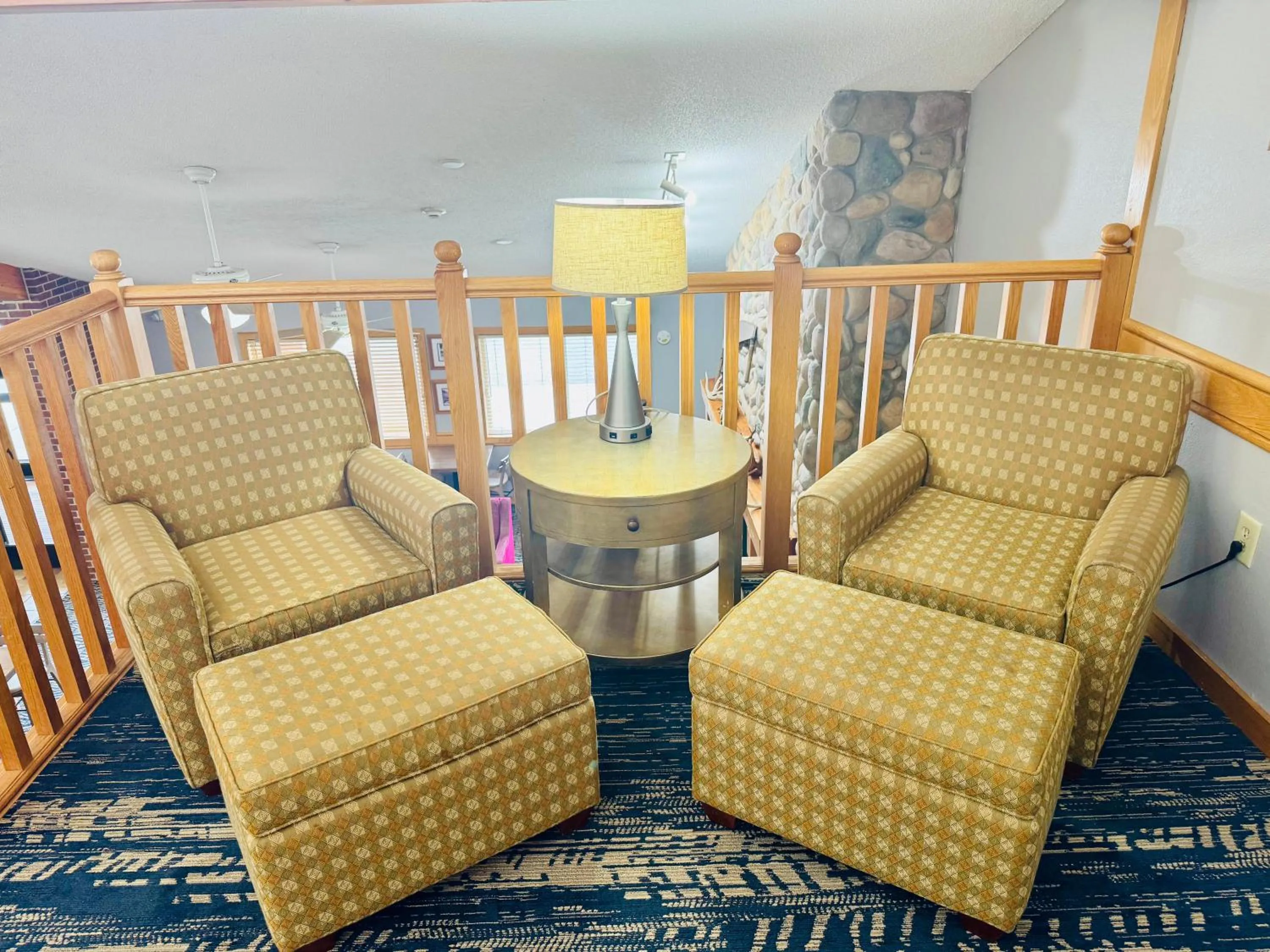 Seating area in AmericInn by Wyndham Stillwater