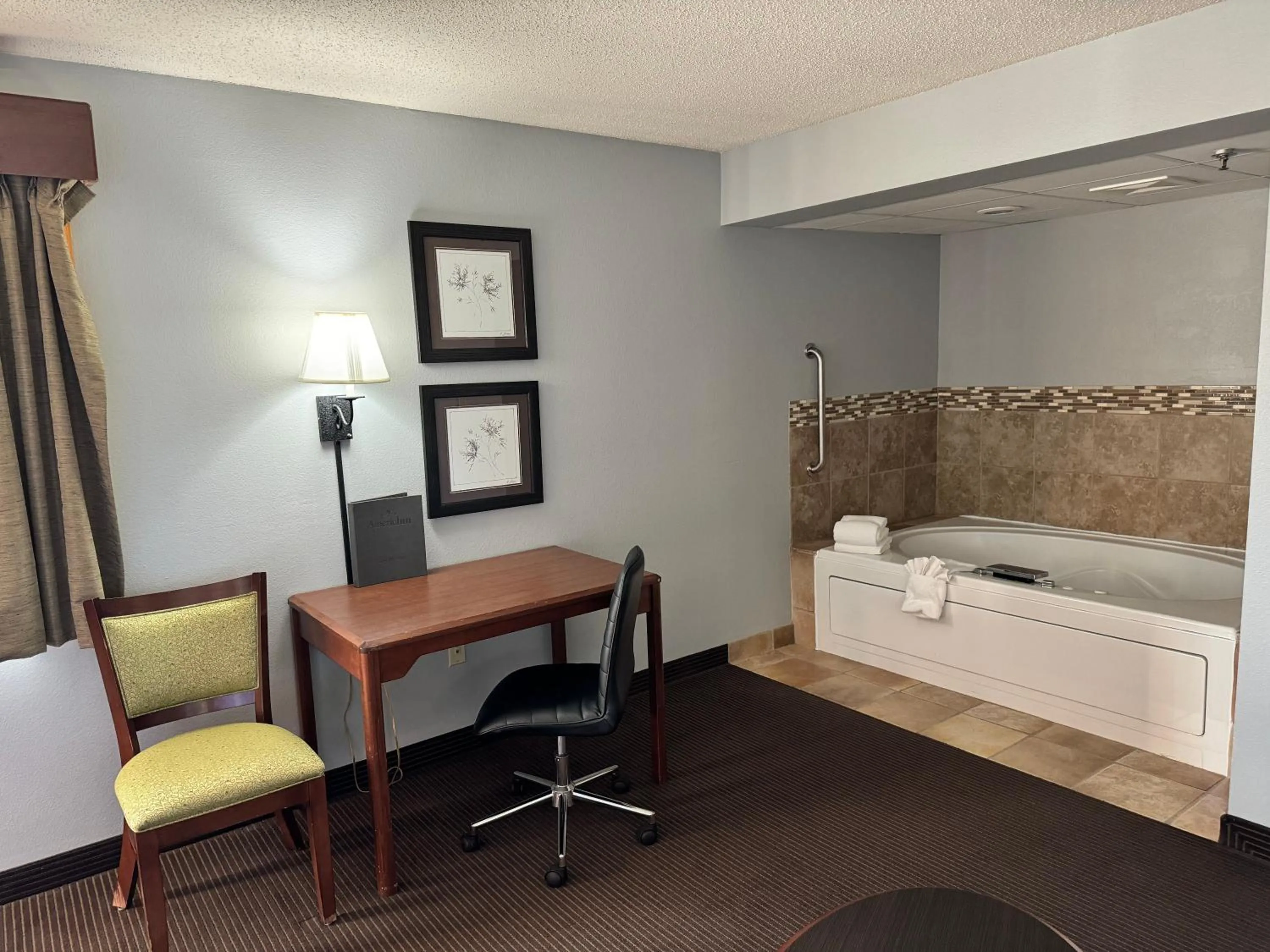 Hot Tub, Bed in AmericInn by Wyndham Stillwater
