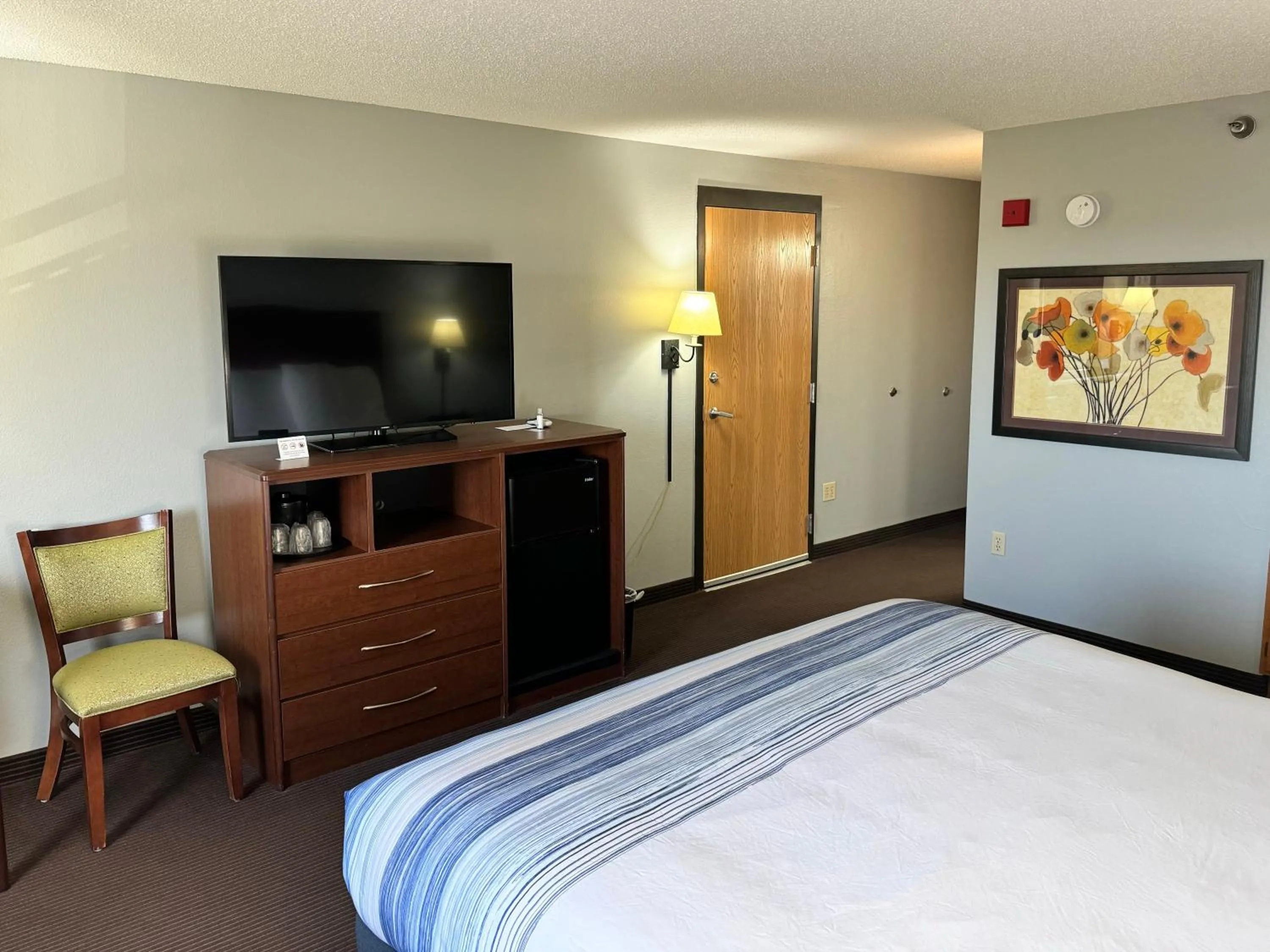 Bed in AmericInn by Wyndham Stillwater