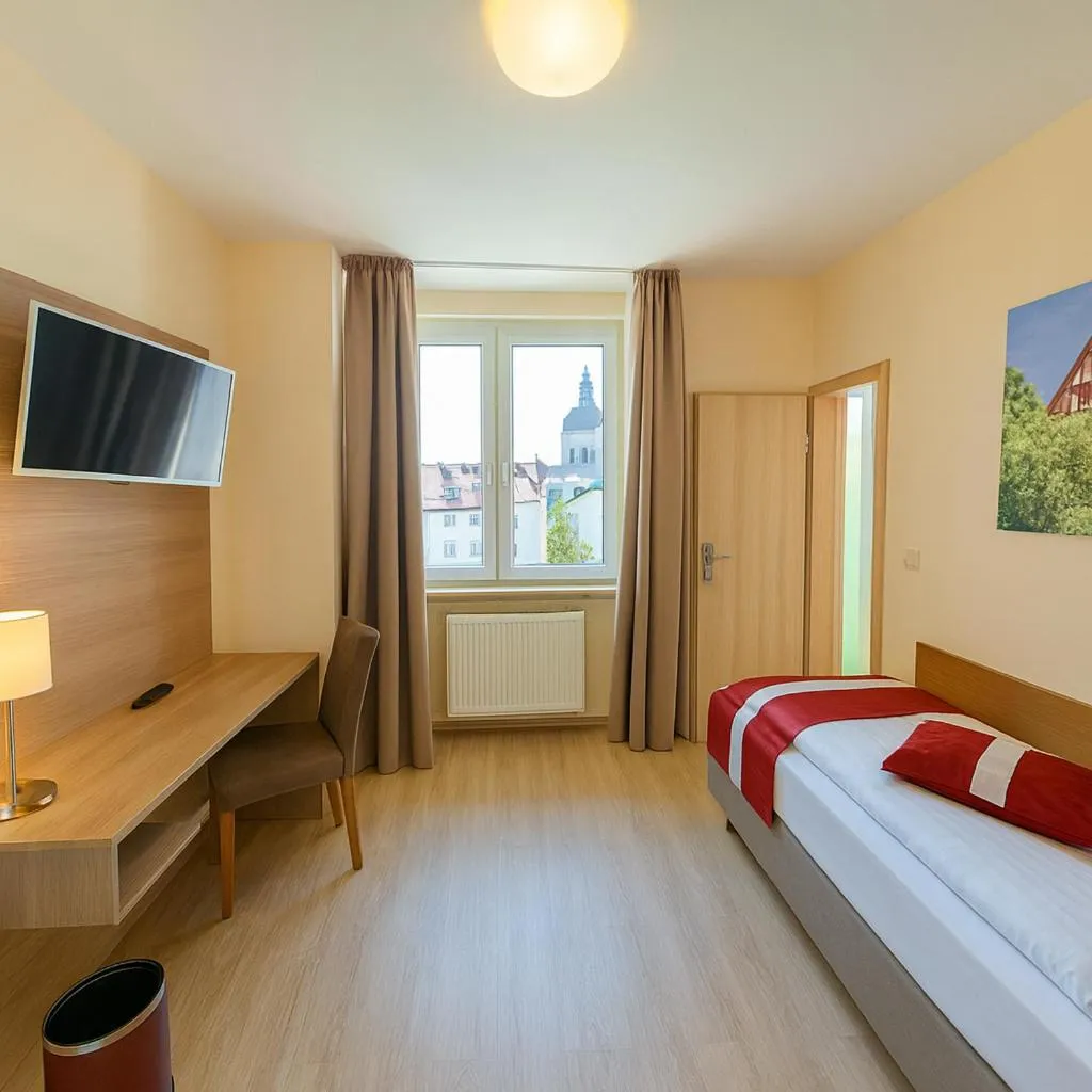 Photo of the whole room, Bed in Mainzer Hof