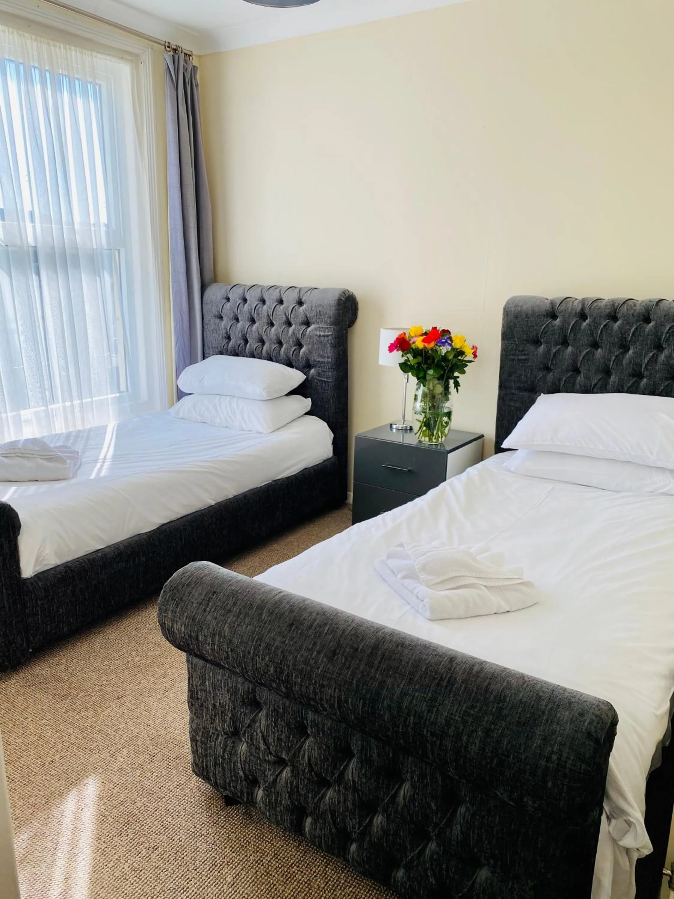 Bed in Villa Mentone Hotel