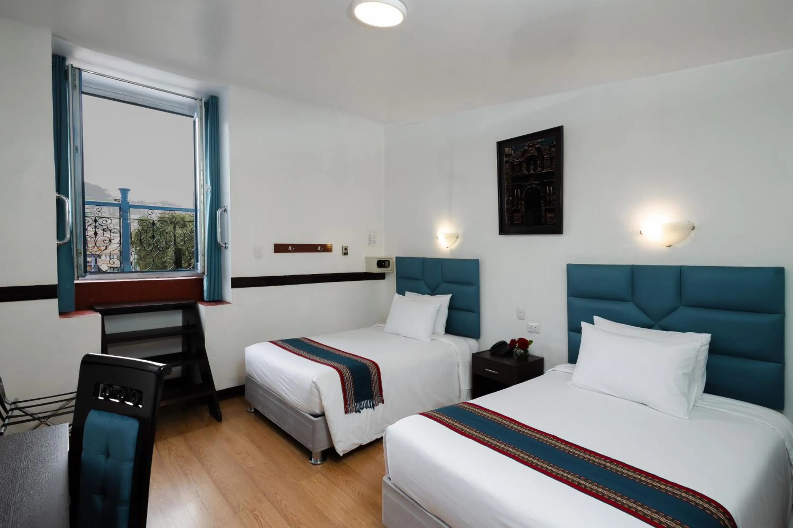 Bed in Hotel Hacienda Cusco Plaza