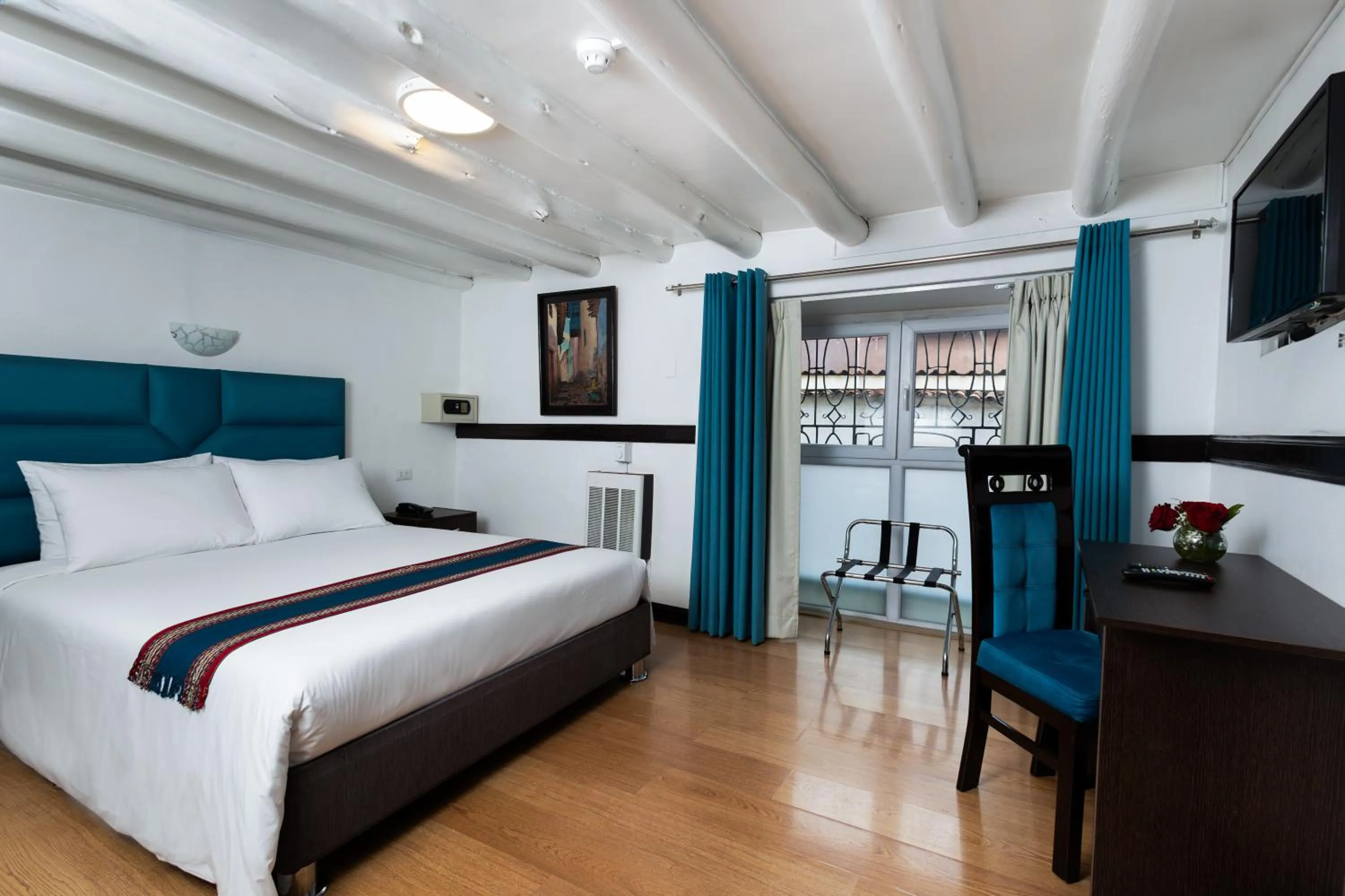 Bed in Hotel Hacienda Cusco Plaza