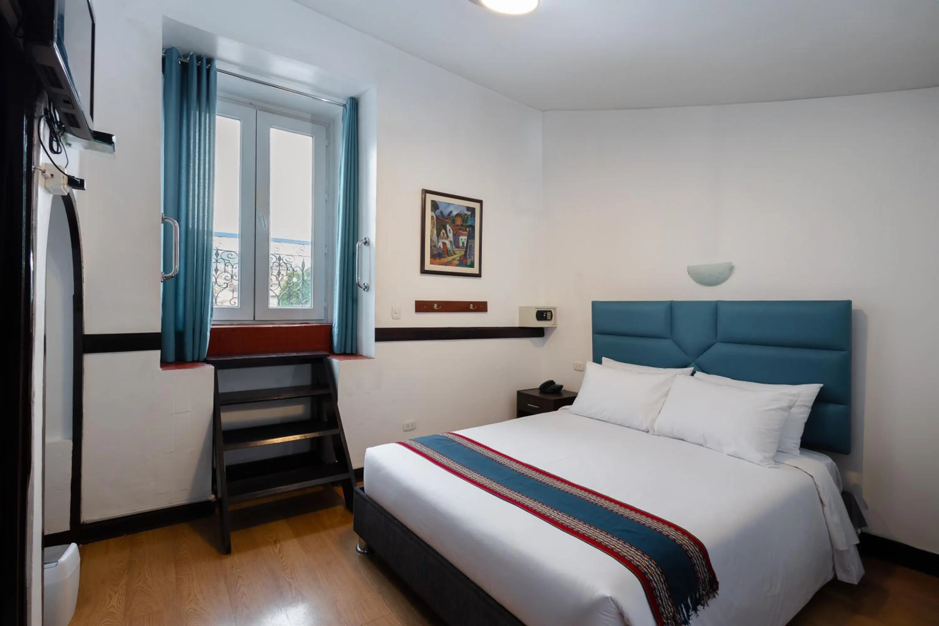 Bed in Hotel Hacienda Cusco Plaza