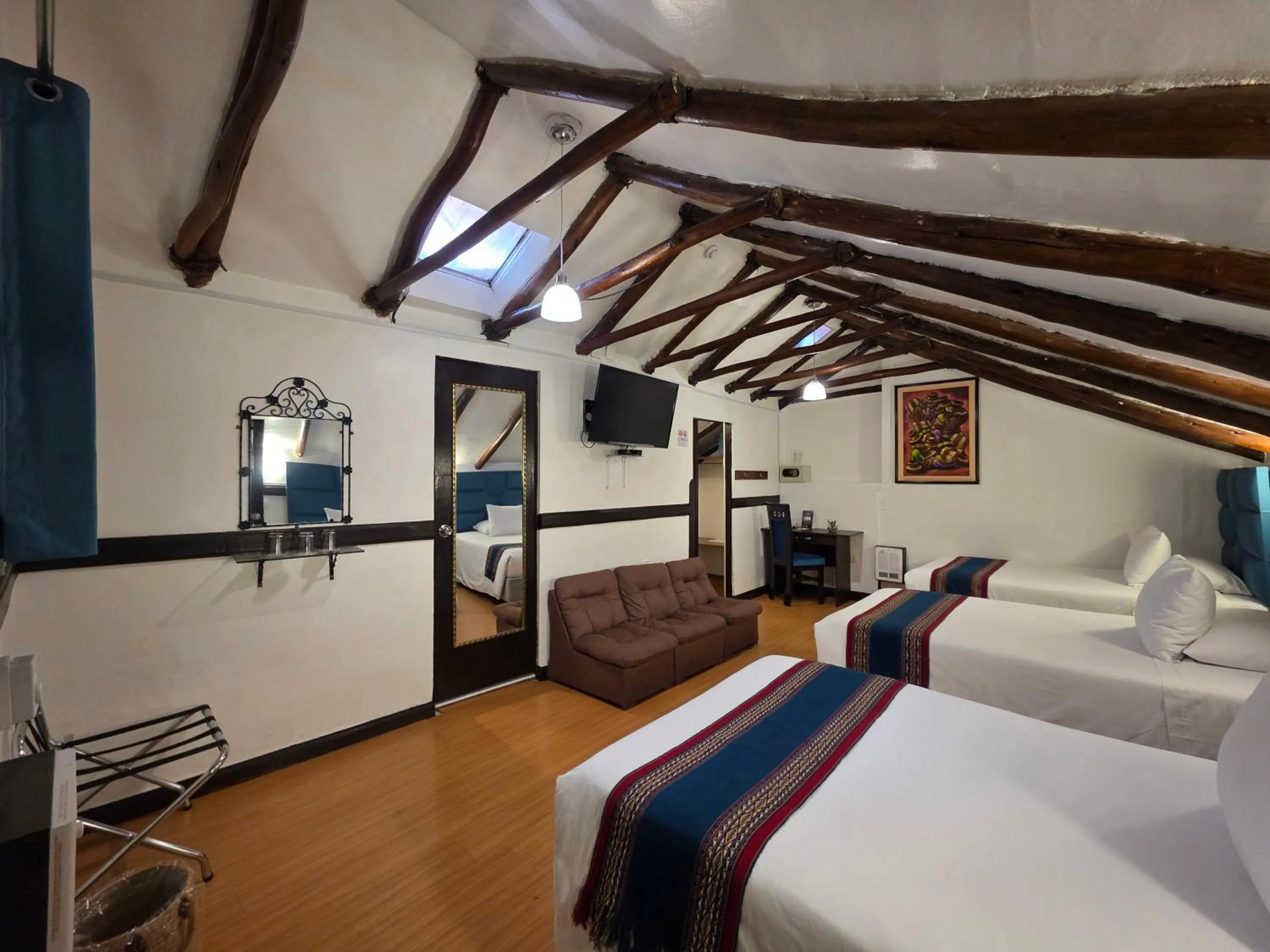 Bed in Hotel Hacienda Cusco Plaza