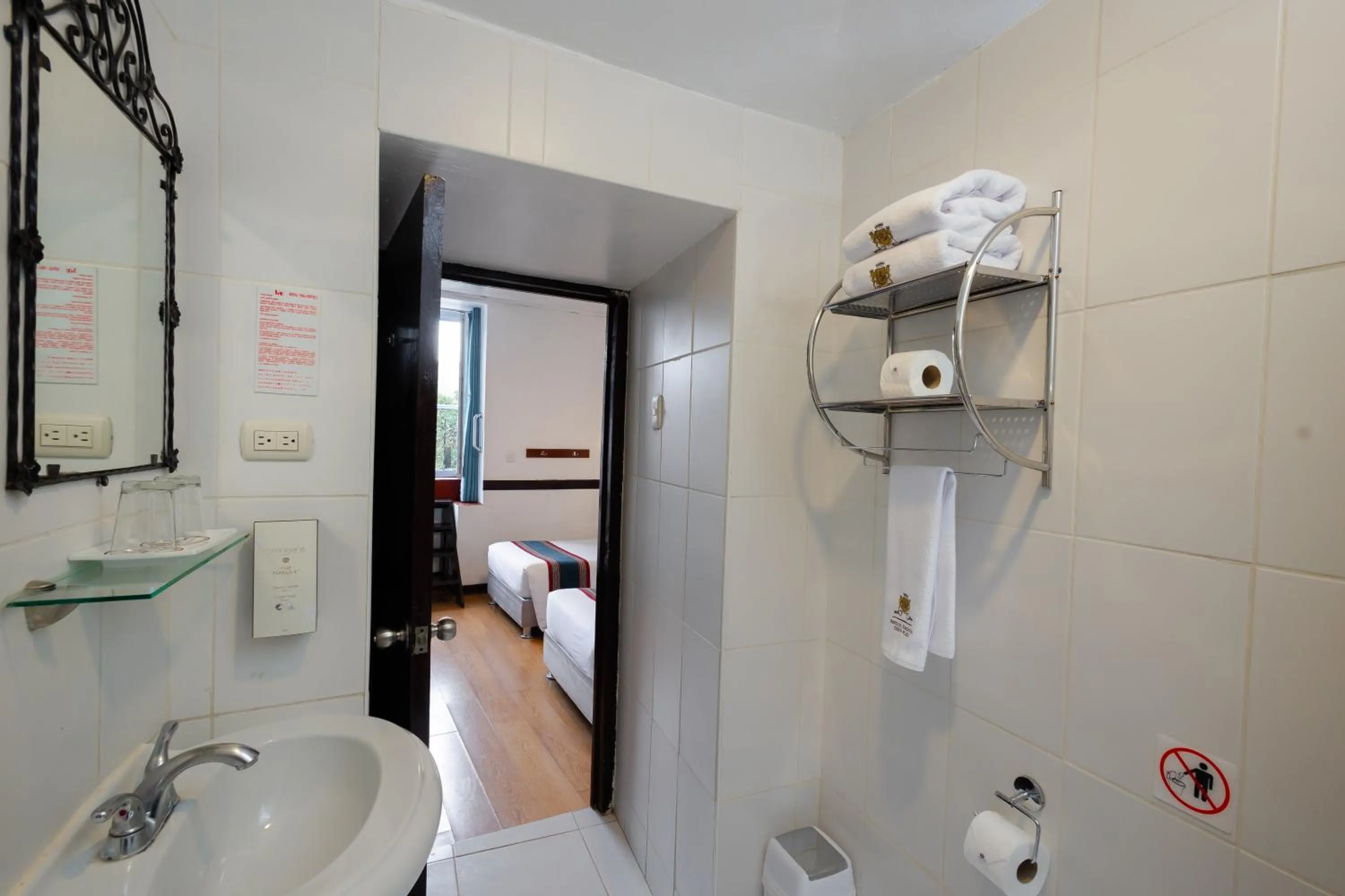 Toilet in Hotel Hacienda Cusco Plaza