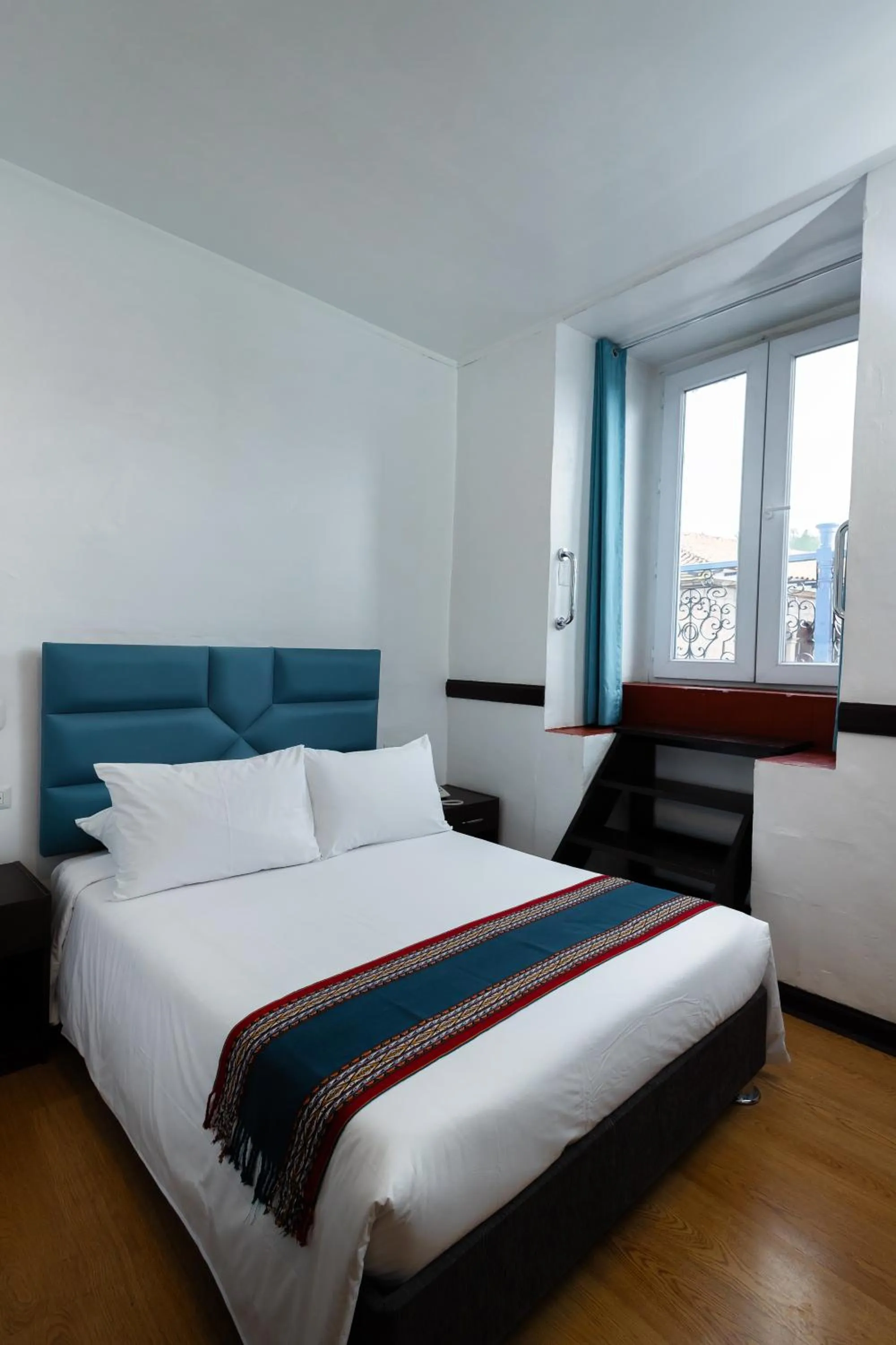 Bed in Hotel Hacienda Cusco Plaza