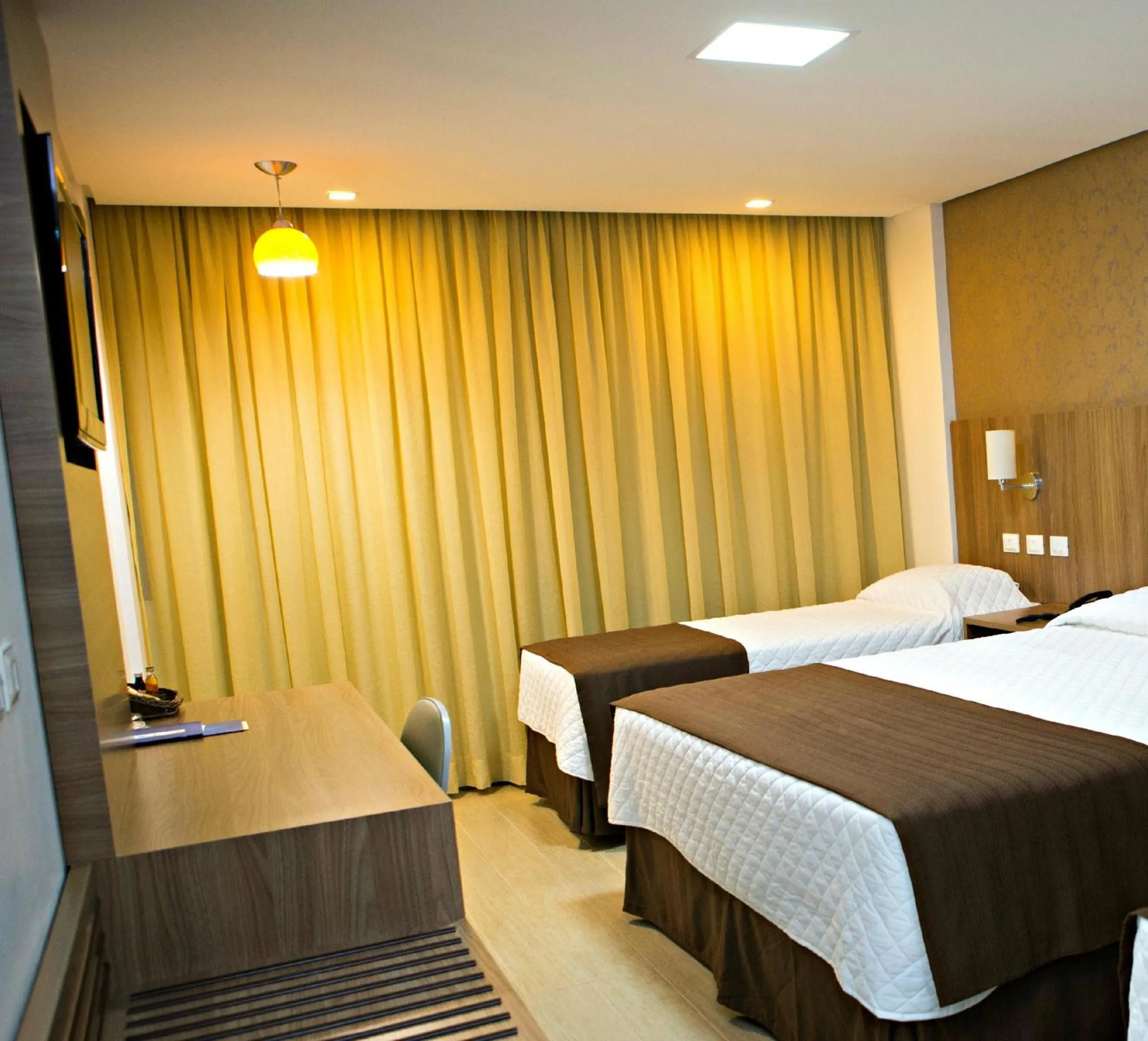 Bed in Foz Presidente Comfort Hotel