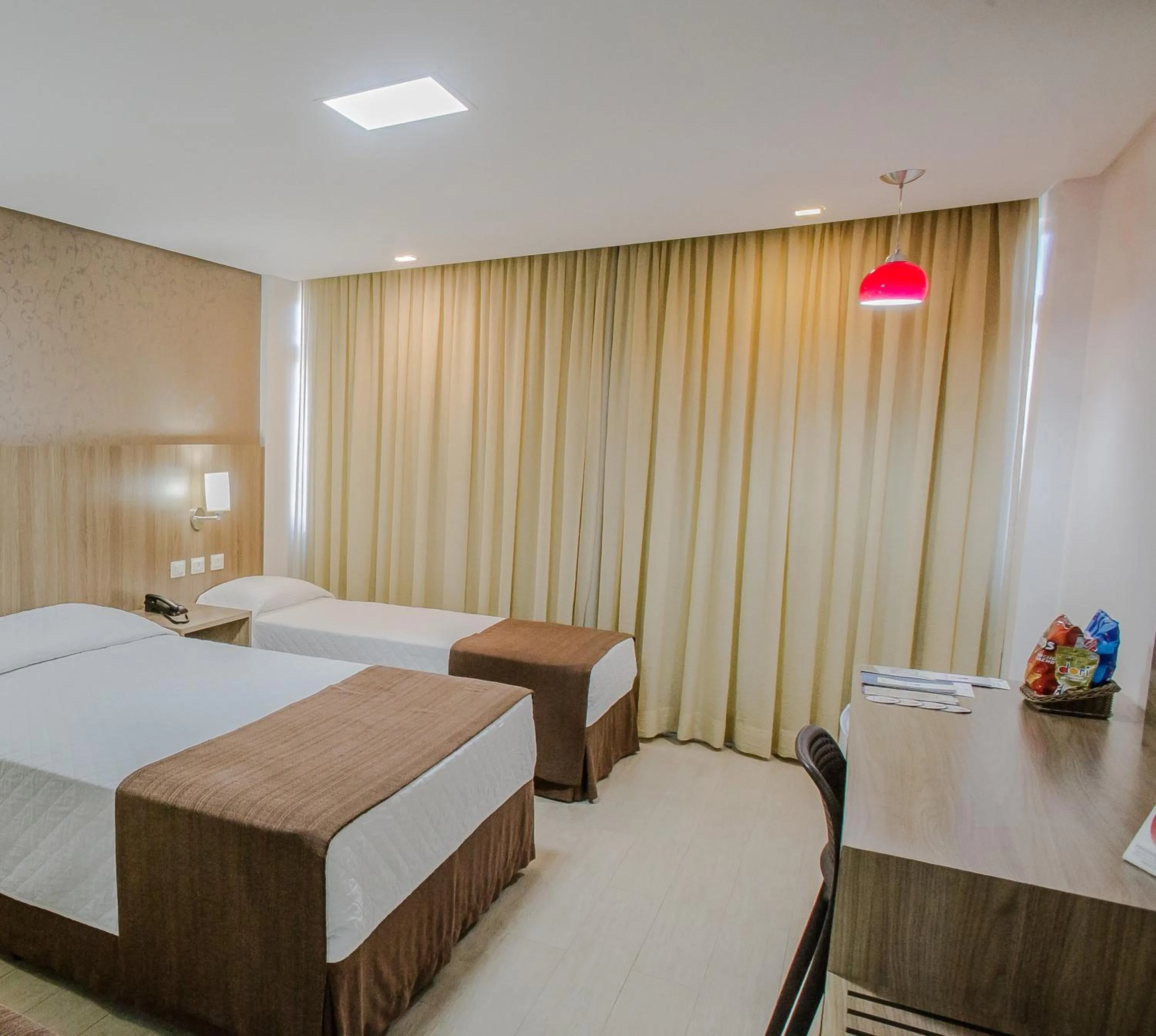 Bed in Foz Presidente Comfort Hotel