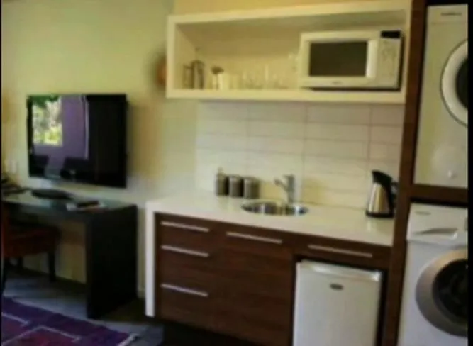 Kitchen or kitchenette in Terra Vive Suites & Apartments