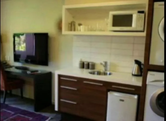 Kitchen or kitchenette in Terra Vive Suites & Apartments