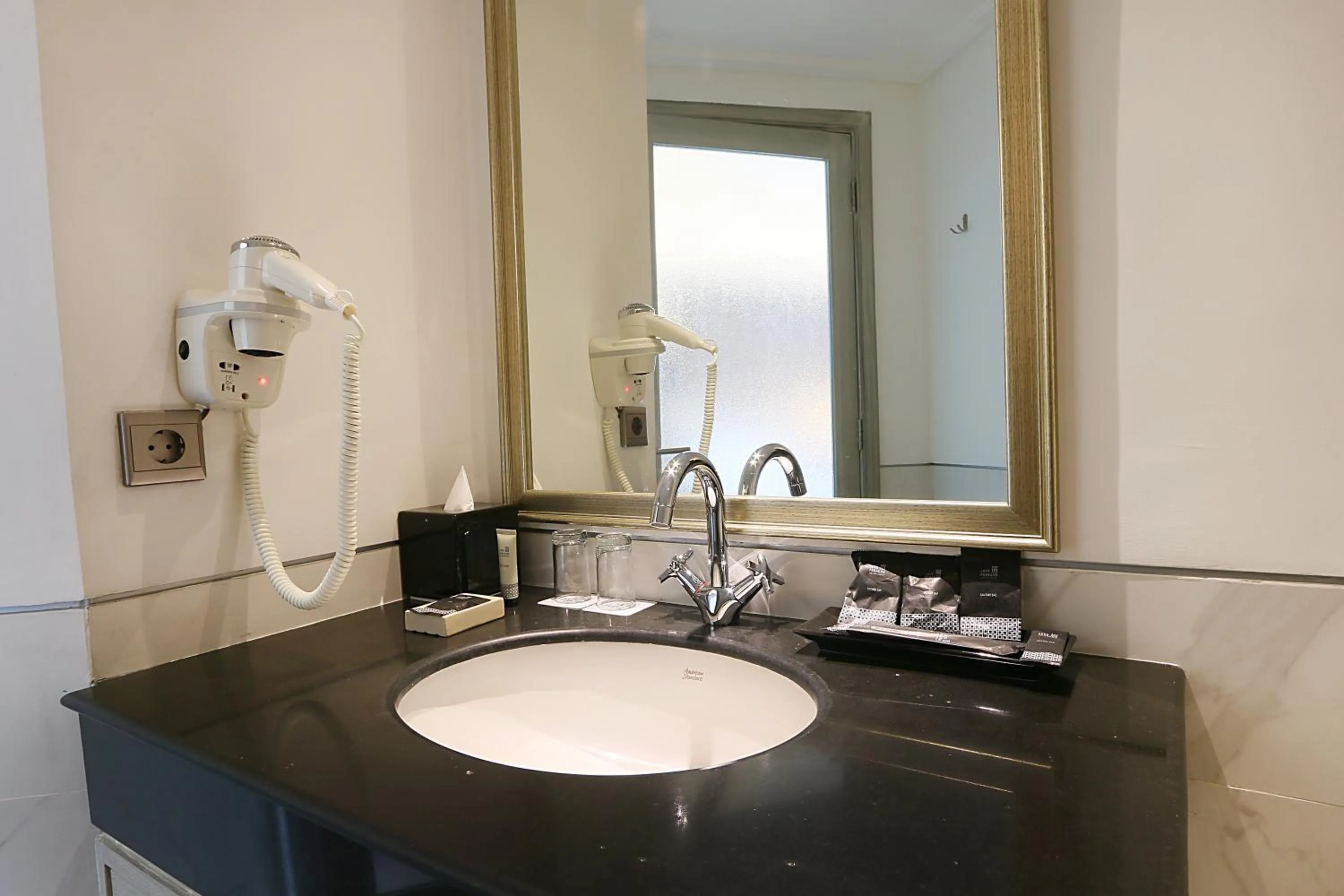 Bathroom in Java Paragon Hotel & Residences