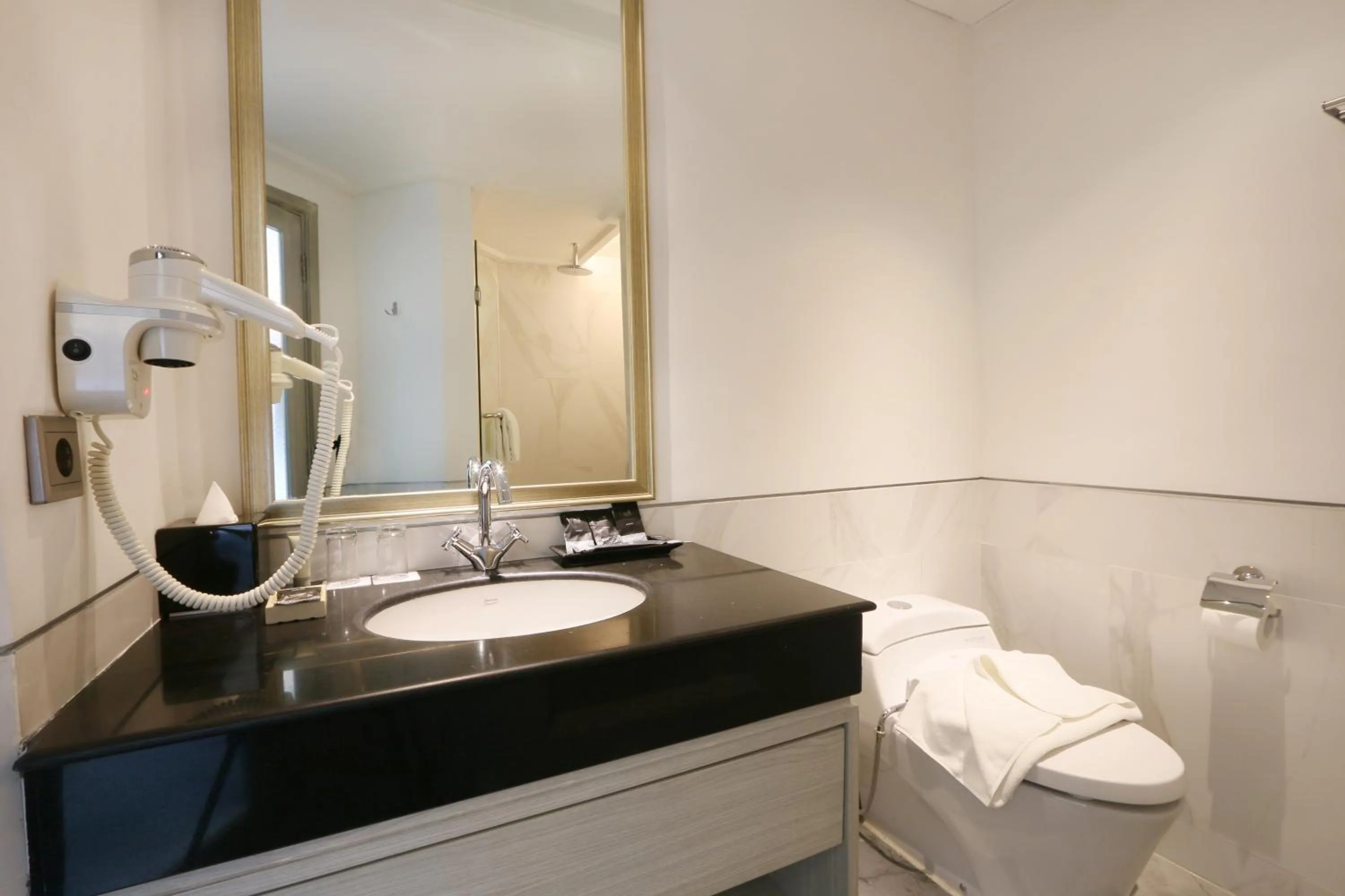 Bathroom in Java Paragon Hotel & Residences