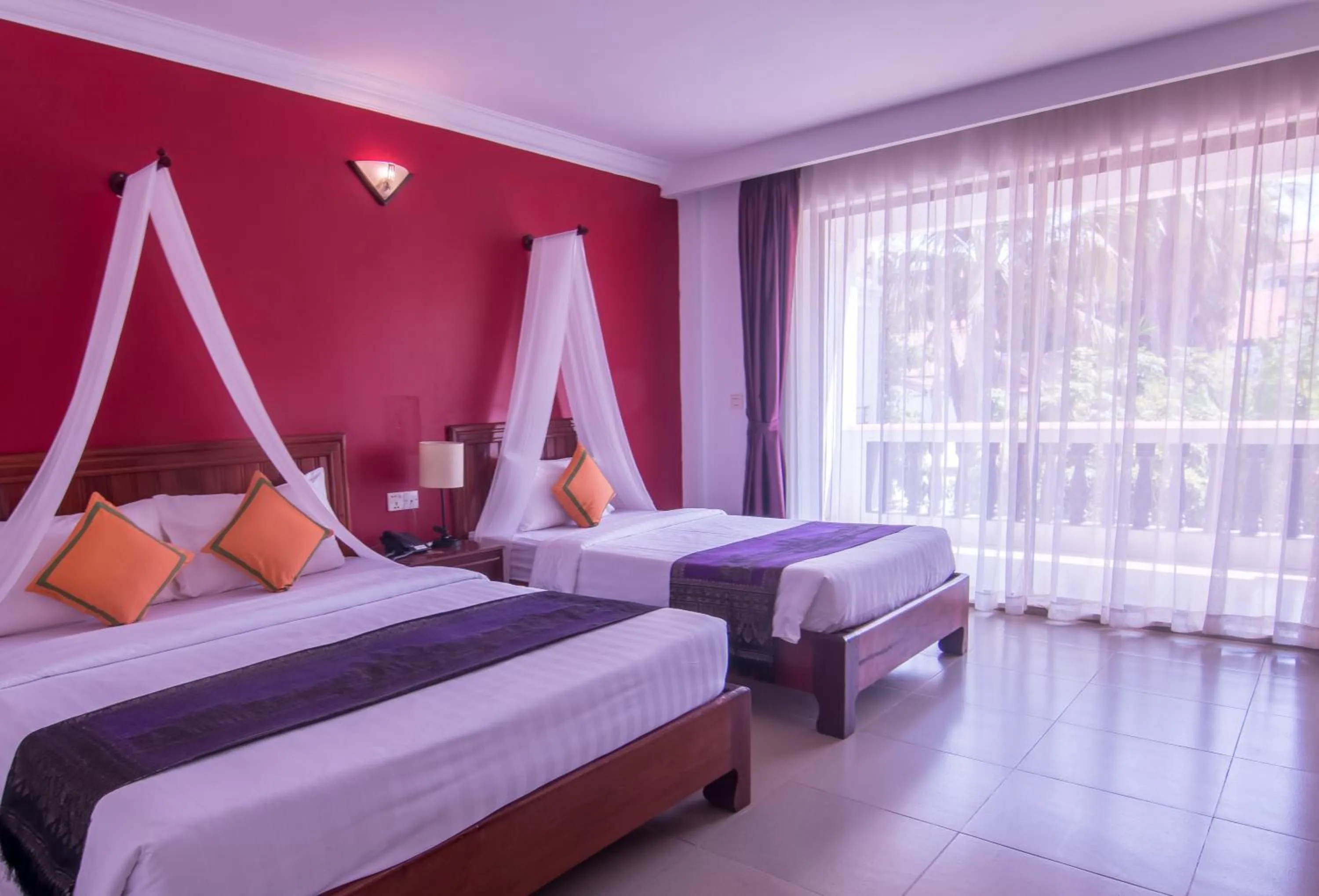 Bed in Mekong Angkor Palace Hotel