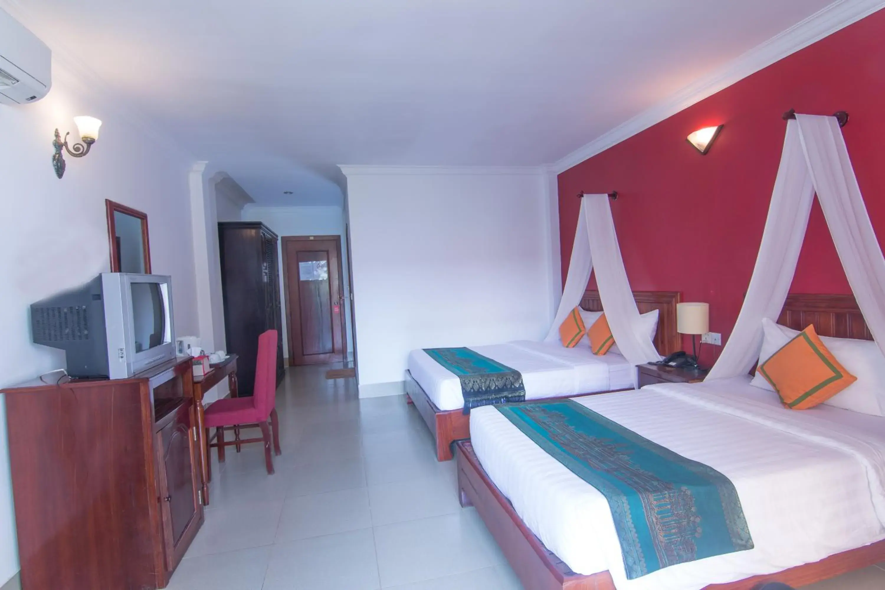 Bed in Mekong Angkor Palace Hotel Bed in Mekong Angkor Palace Hotel