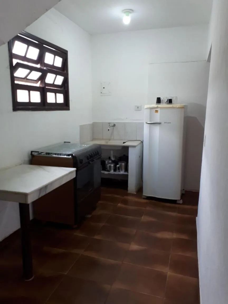 Kitchen or kitchenette in Pousada Chalés Vereda do Sol