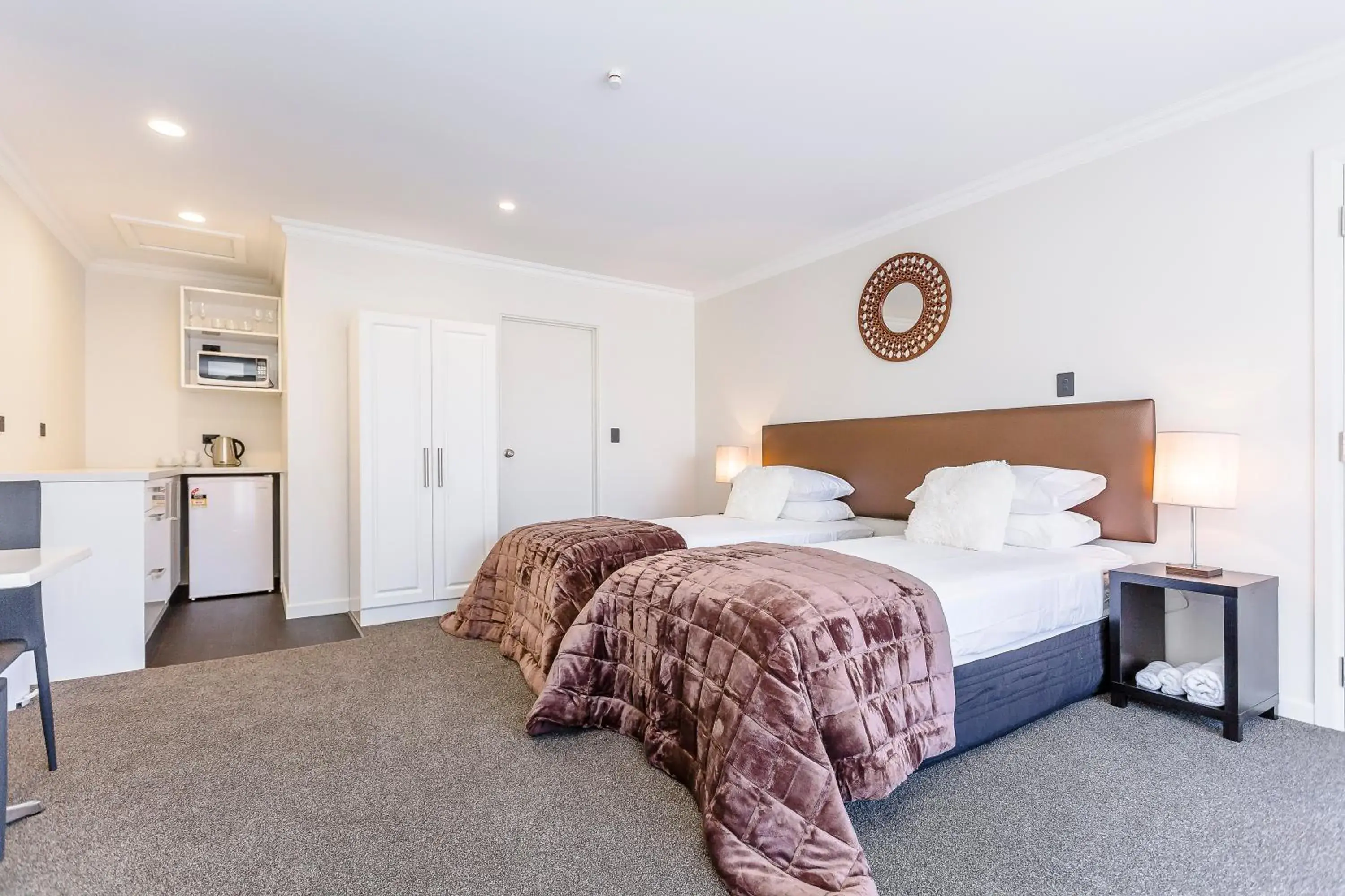 Bed in Superior Dunedin Apartments Bed in Superior Dunedin Apartments