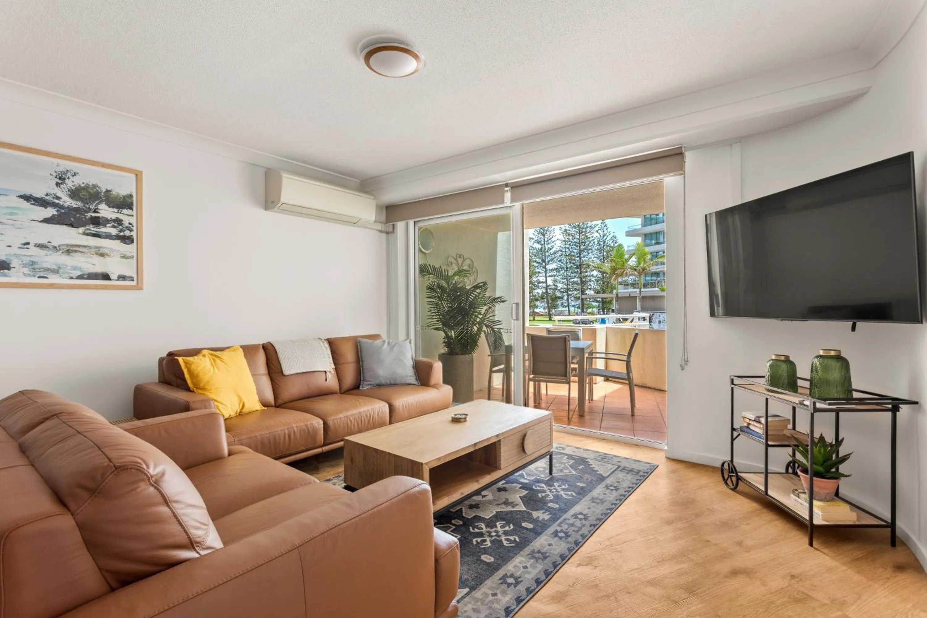 Communal lounge/ TV room in Kirra Palms Holiday Apartments