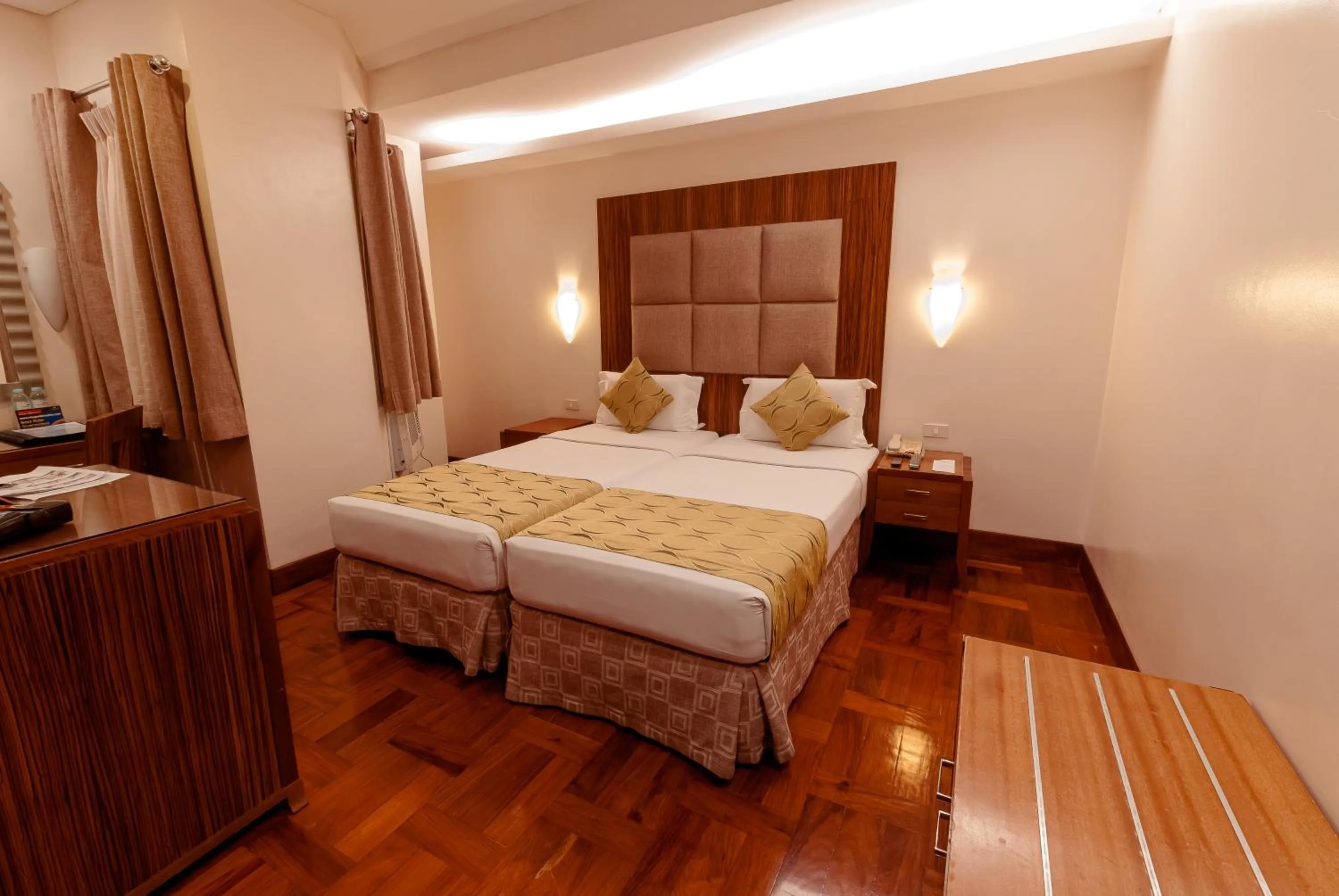 Bed in City Garden Suites Manila