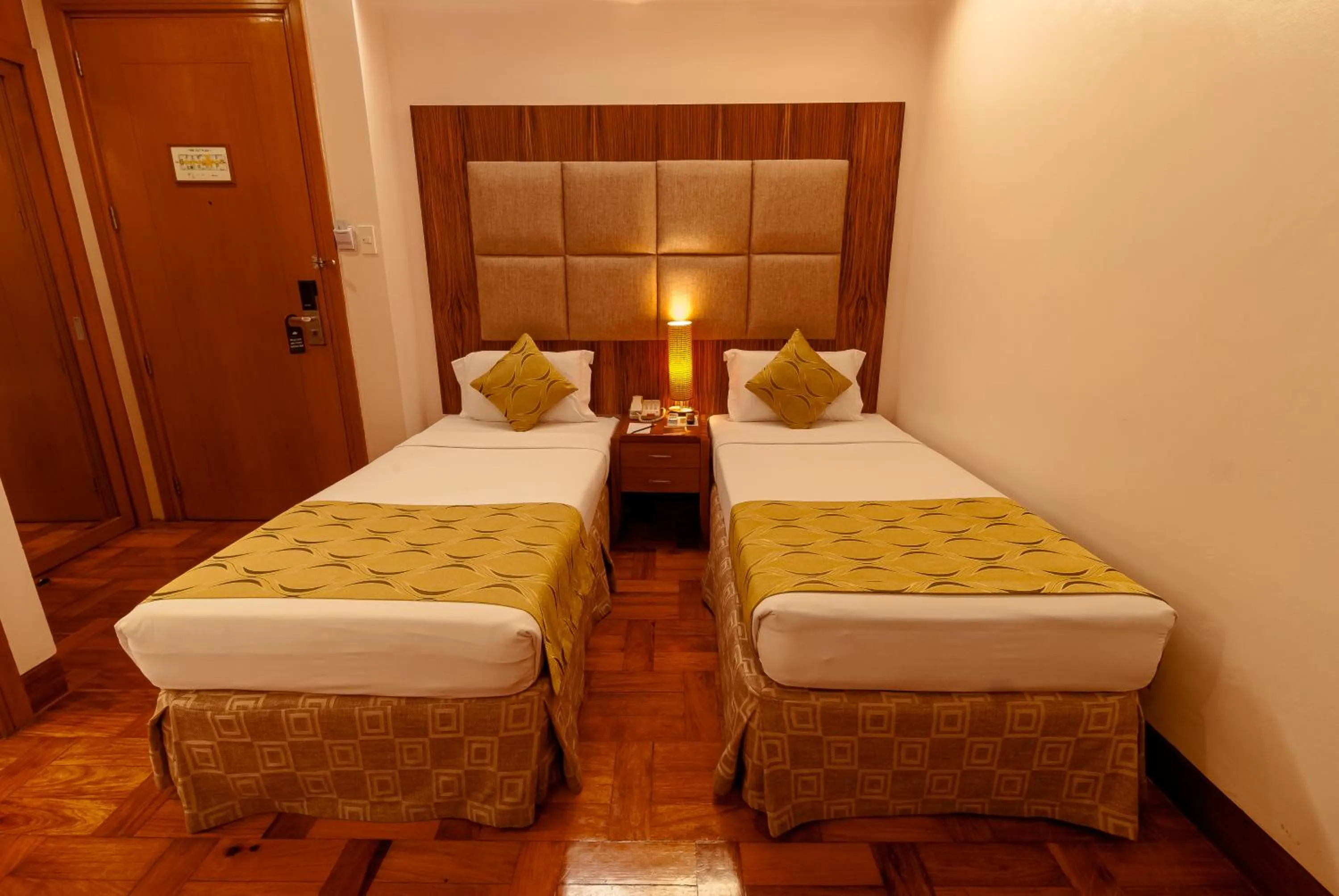 Bed in City Garden Suites Manila