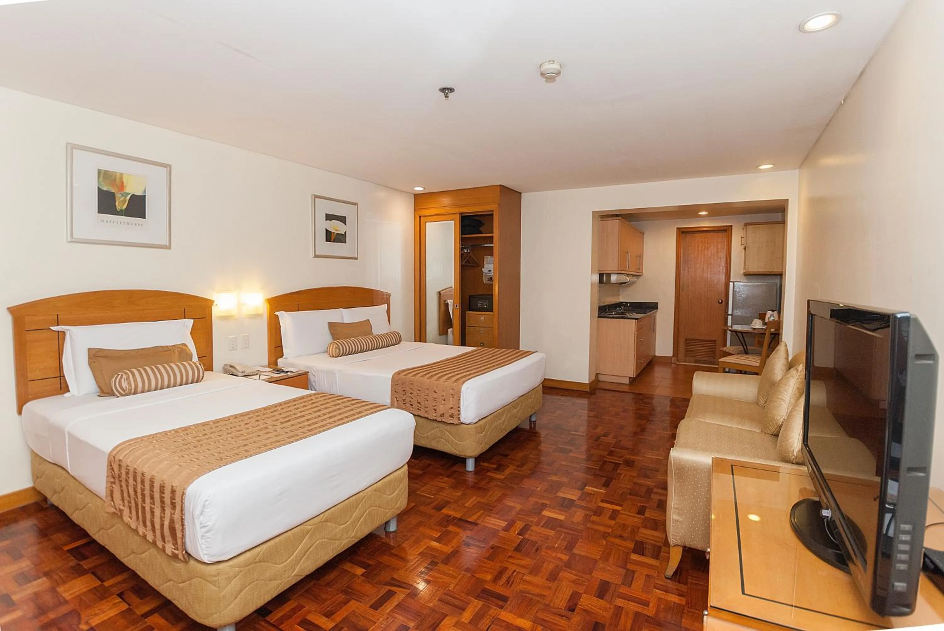 Bed in City Garden Suites Manila