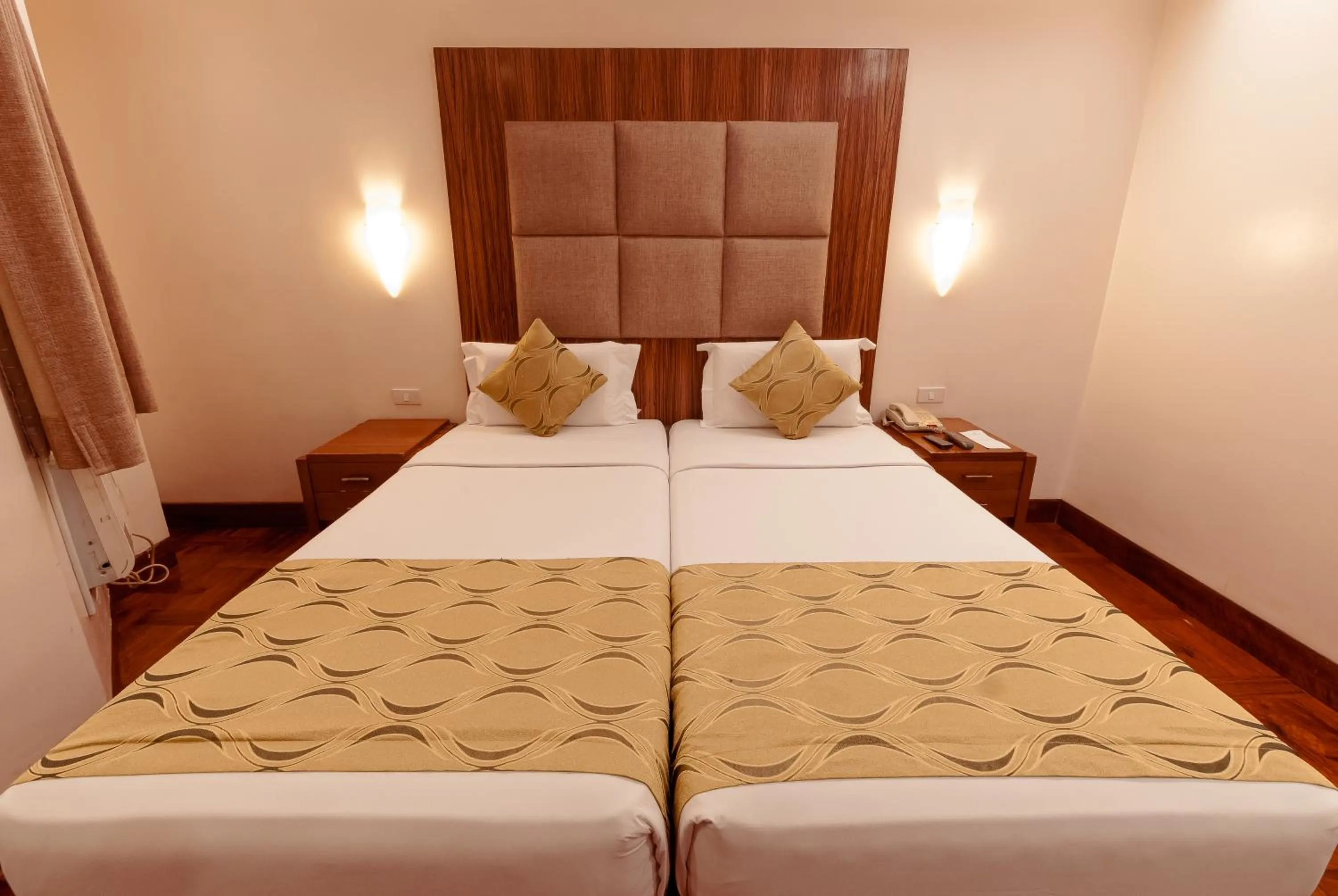 Bed in City Garden Suites Manila