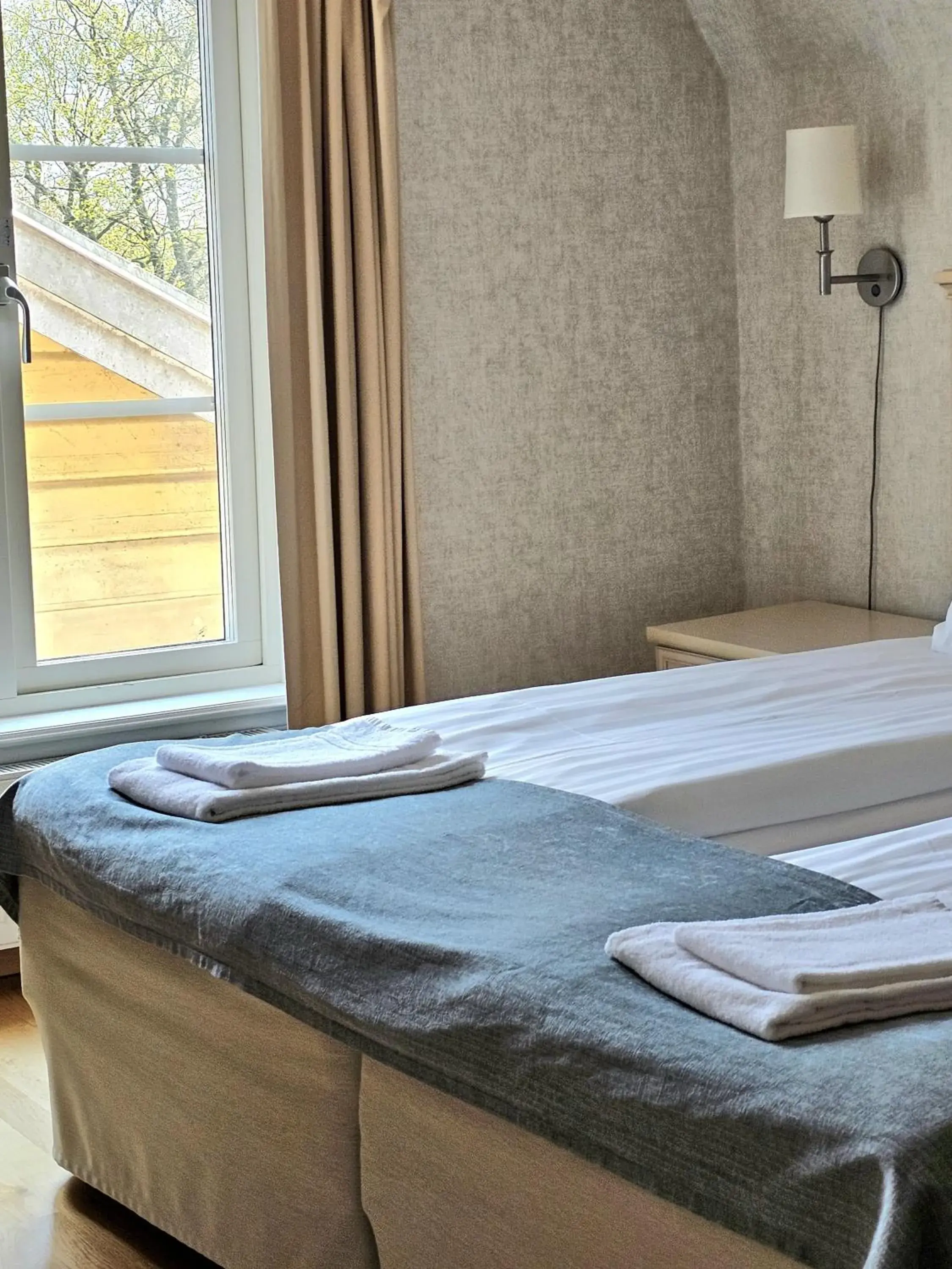 View (from property/room), Bed in Hotel Skansen View (from property/room), Bed in Hotel Skansen