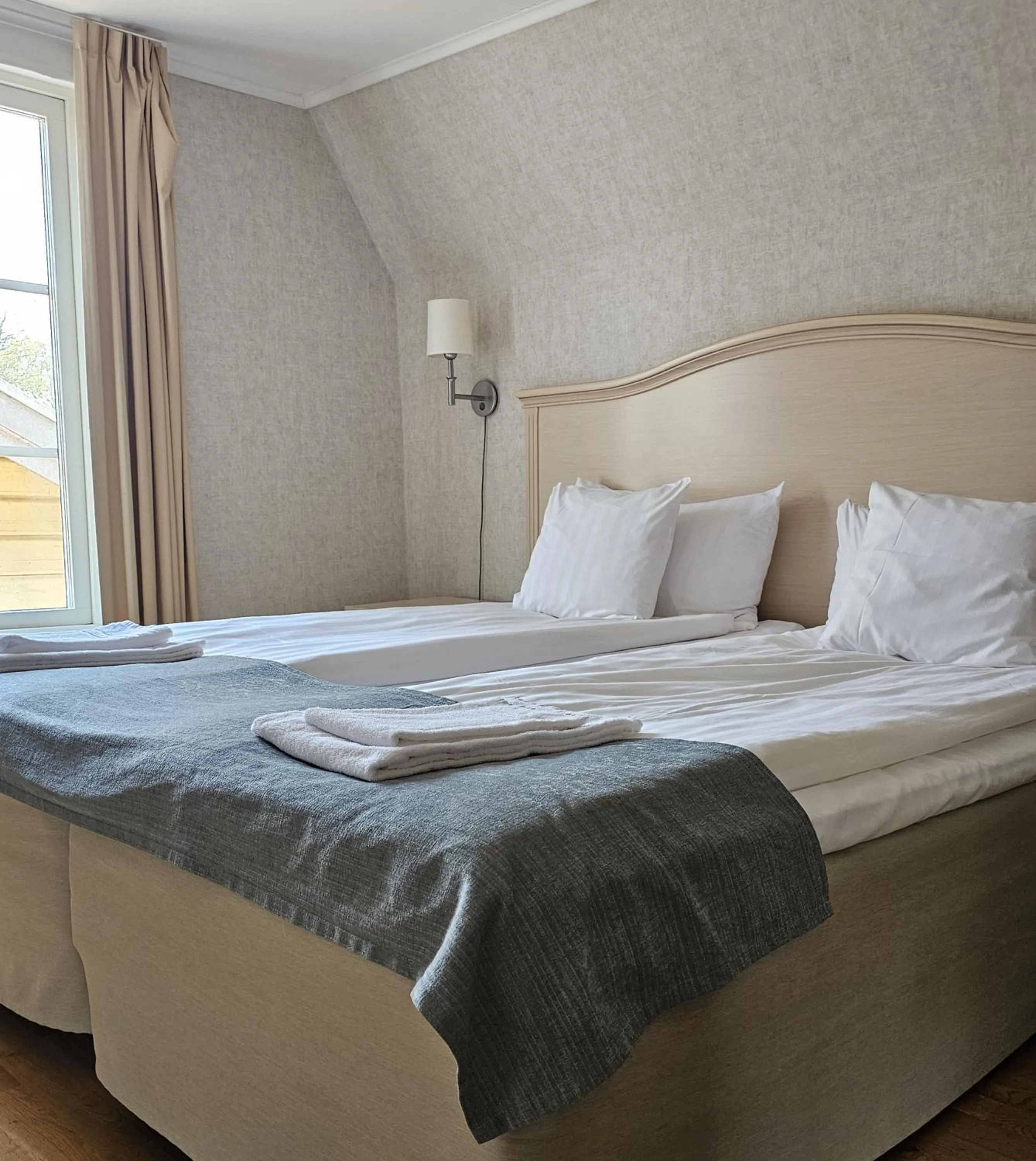 Bed in Hotel Skansen