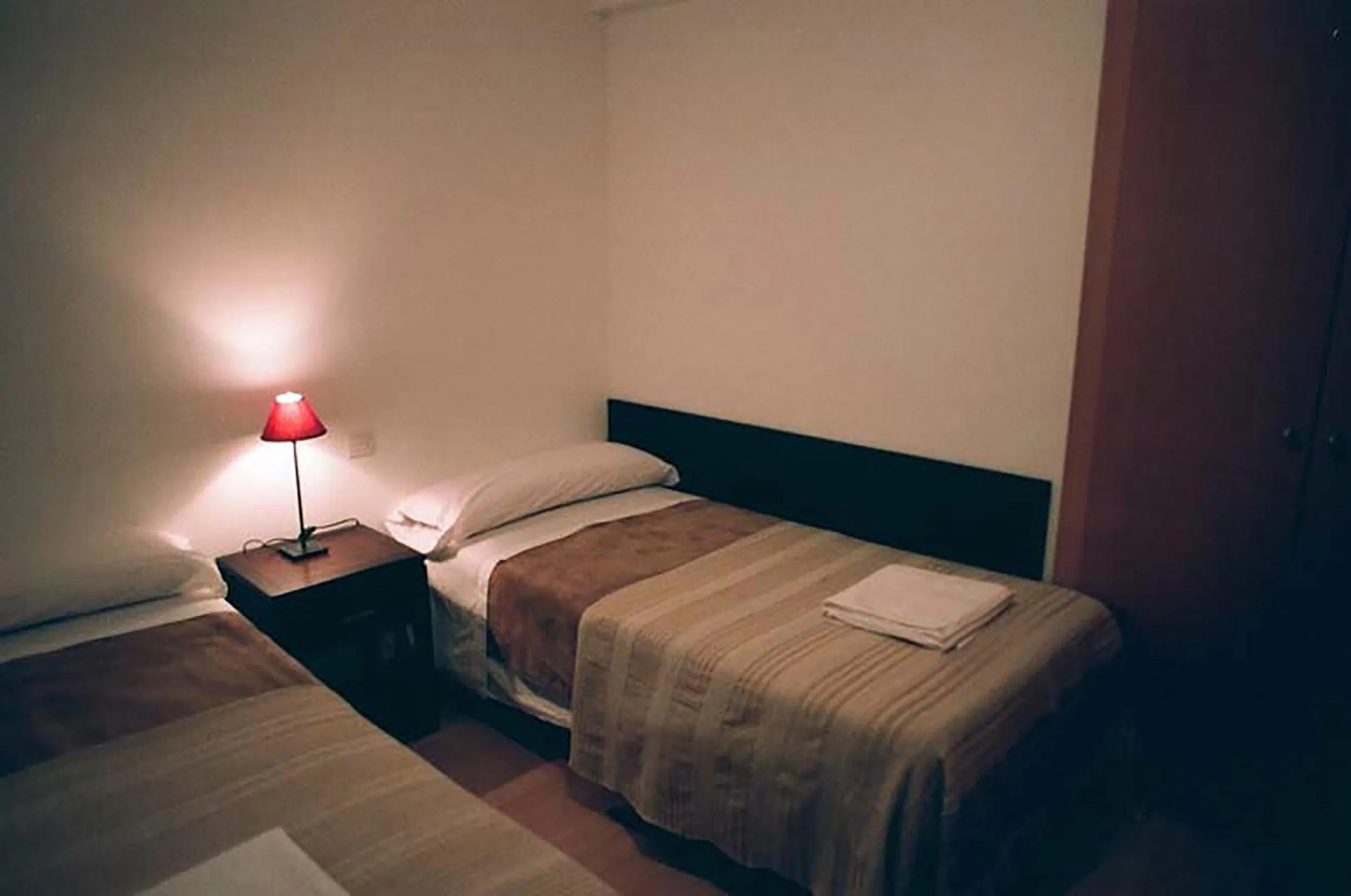 Bed in Apartamentos Auhabitat Zaragoza, edificio de apartamentos turísticos