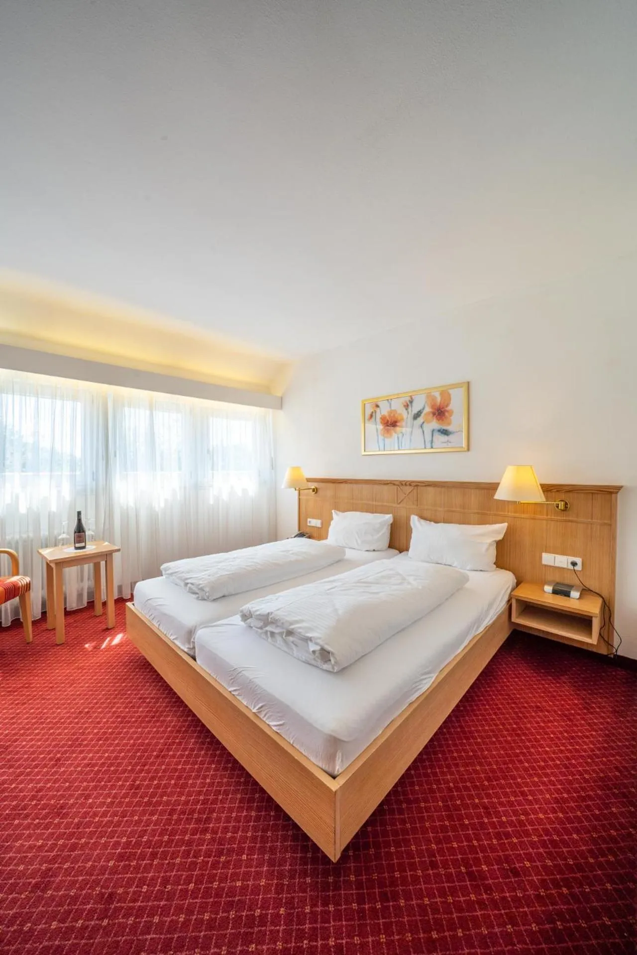 Photo of the whole room, Bed in Weinhotel Pfeffer & Salz