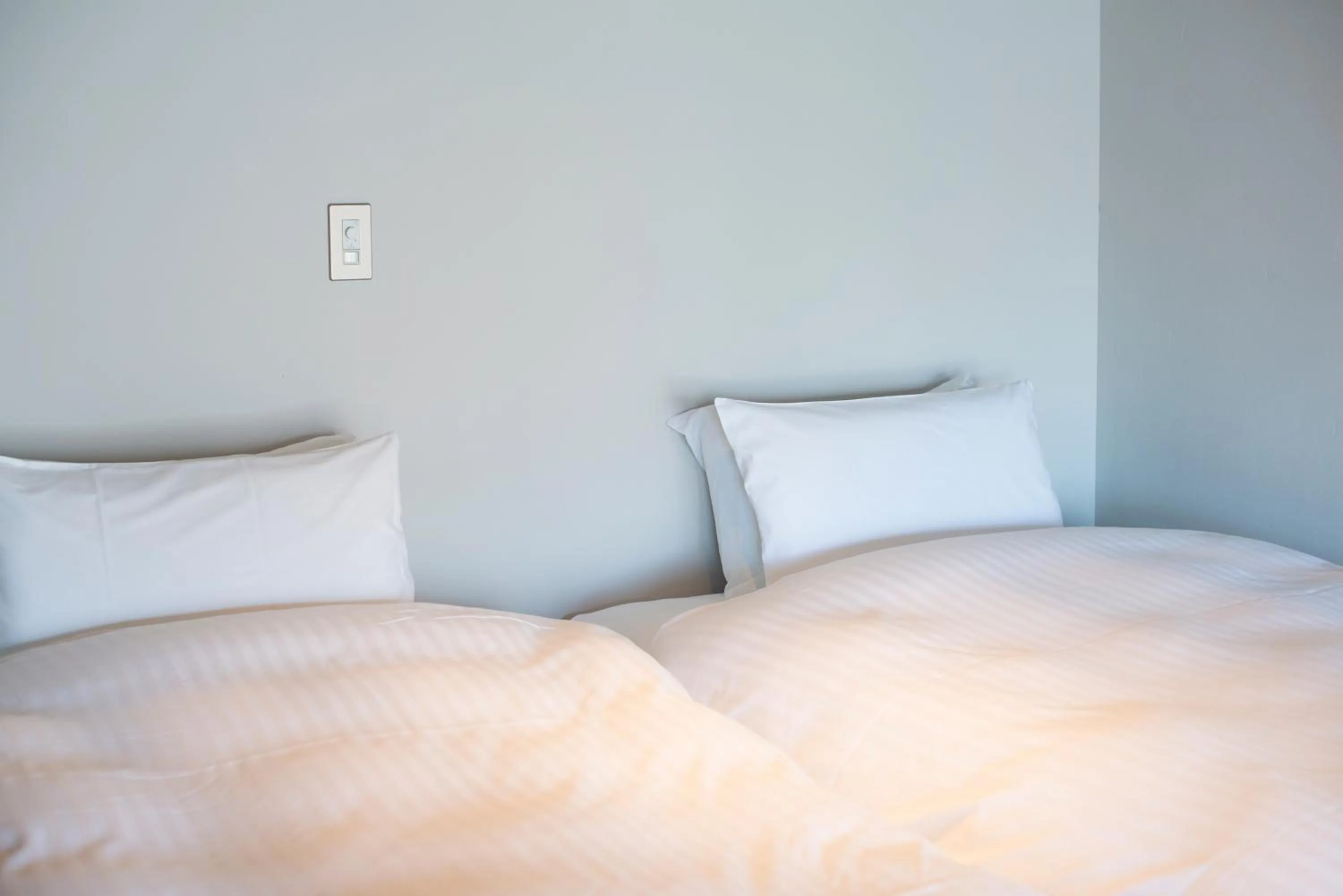 Bed in A Good Day Fukuoka Riverside